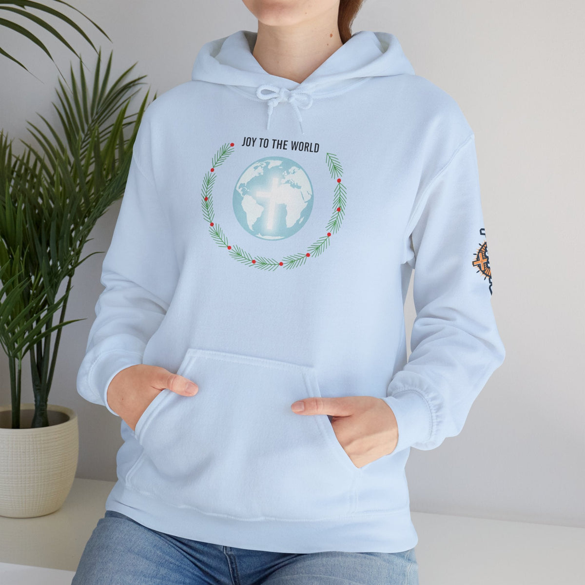 Joy to the World Hoodie – Wreath Earth Nativity Christian Christmas Sweatshirt for Isaiah 9:6 Holiday Faith & Festive Joy Printify