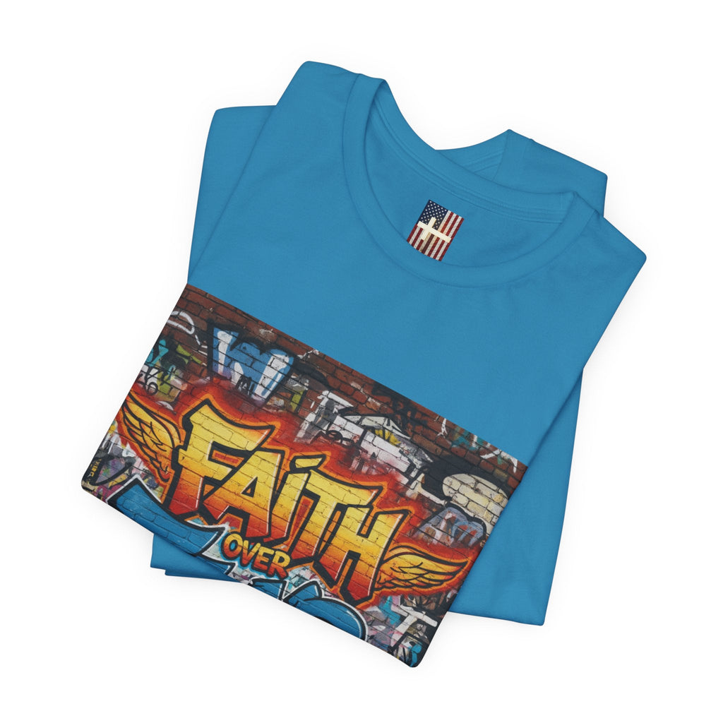 Faith Over Fear T-shirt – Graffiti Wall Christian T-shirt for Bold 2 Corinthians 5:7 Streetwear & Unshakable Faith Printify