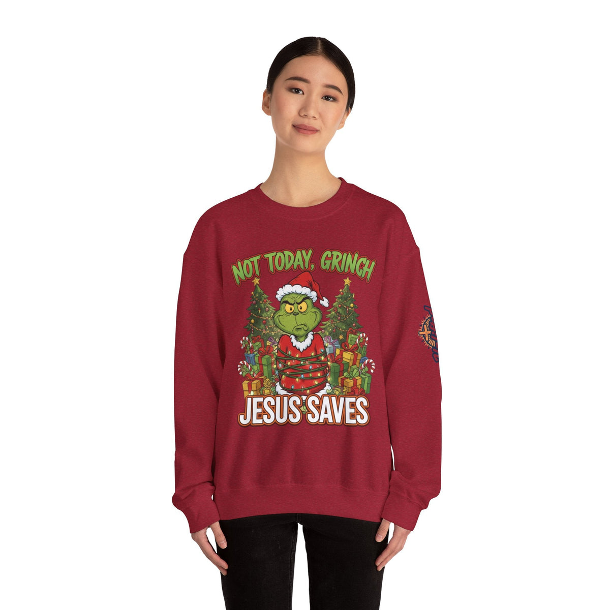 🎄 Not Today, Grinch – Jesus Saves | Funny Christian Christmas Sweatshirt | Sulking Grinch & Glowing Cross | Bold Neon Faith Tee by Uplifted Gear Printify