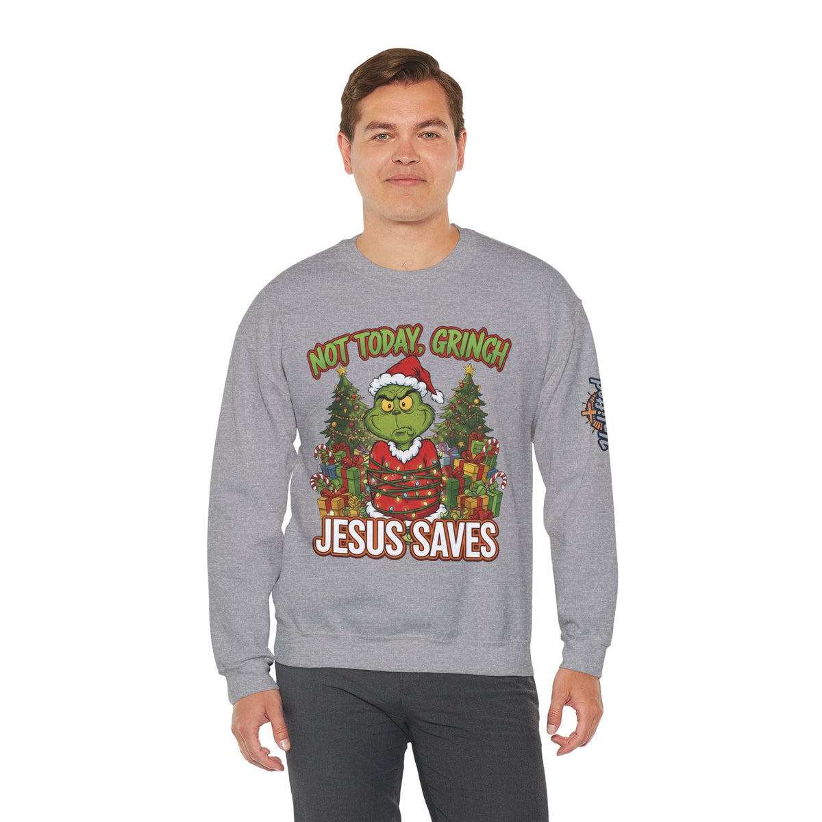 🎄 Not Today, Grinch – Jesus Saves | Funny Christian Christmas Sweatshirt | Sulking Grinch & Glowing Cross | Bold Neon Faith Tee by Uplifted Gear Printify