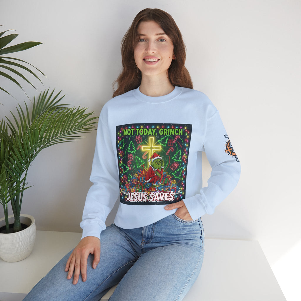 🎄 Not Today, Grinch – Jesus Saves | Funny Christian Christmas Sweatshirt | Festive Green & Red Cartoon Style | Bold Faith Holiday Tee by Uplifted Gear Printify