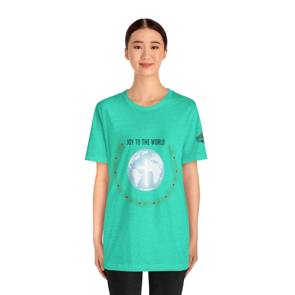 Joy to the World T-shirt – Wreath Earth Nativity Christian Christmas T-shirt for Isaiah 9:6 Holiday Faith & Festive Joy Printify
