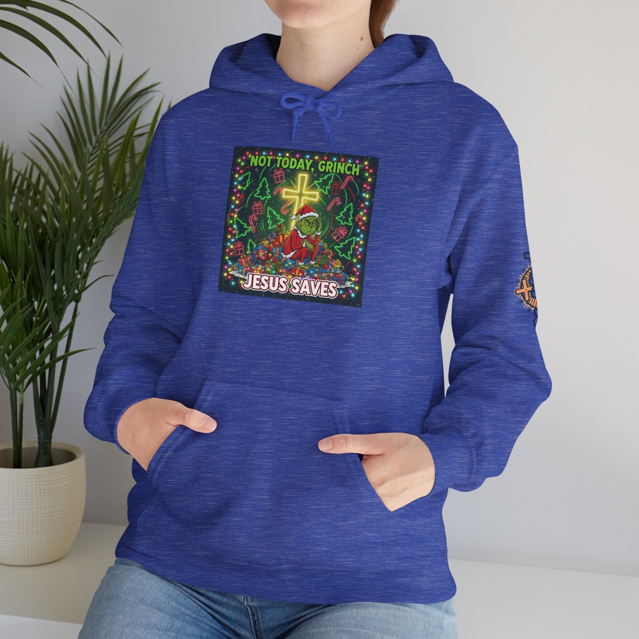 🎄 Not Today, Grinch – Jesus Saves | Funny Christian Christmas Hoodie | Festive Green & Red Cartoon Style | Bold Faith Holiday Tee by Uplifted Gear Printify