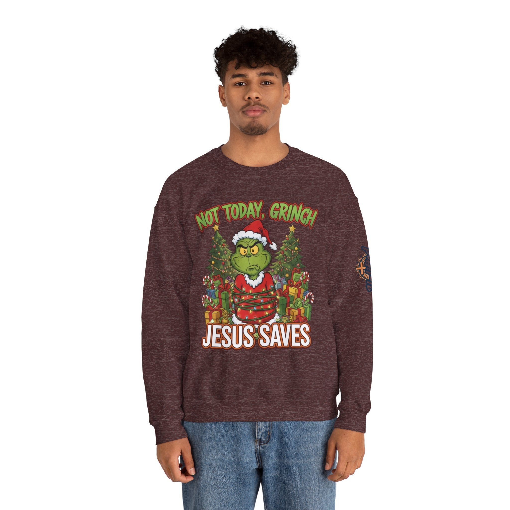 🎄 Not Today, Grinch – Jesus Saves | Funny Christian Christmas Sweatshirt | Sulking Grinch & Glowing Cross | Bold Neon Faith Tee by Uplifted Gear Printify