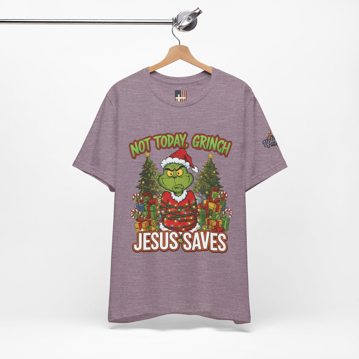 🎄 Not Today, Grinch – Jesus Saves | Funny Christian Christmas T-Shirt | Sulking Grinch & Glowing Cross | Bold Neon Faith Tee by Uplifted Gear Printify