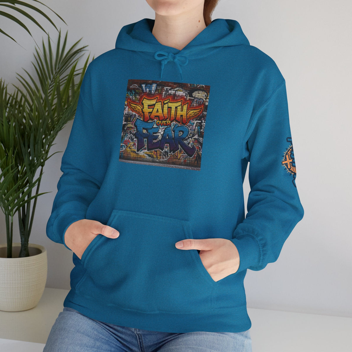 Faith Over Fear Hoodie – Graffiti Wall Christian Sweatshirt for Bold 2 Corinthians 5:7 Streetwear & Unshakable Faith Printify
