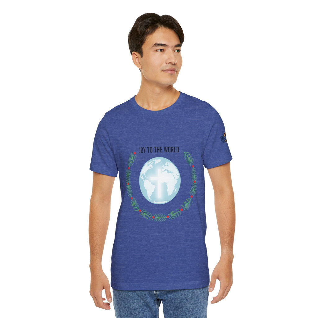 Joy to the World T-shirt – Wreath Earth Nativity Christian Christmas T-shirt for Isaiah 9:6 Holiday Faith & Festive Joy Printify
