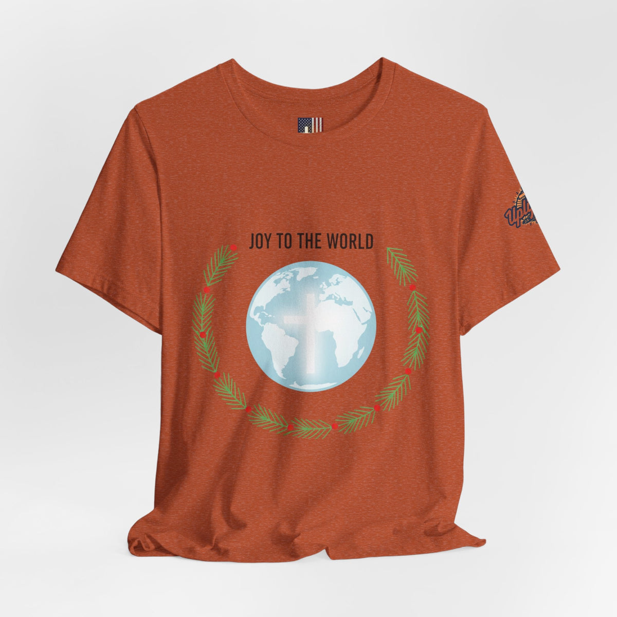 Joy to the World T-shirt – Wreath Earth Nativity Christian Christmas T-shirt for Isaiah 9:6 Holiday Faith & Festive Joy Printify