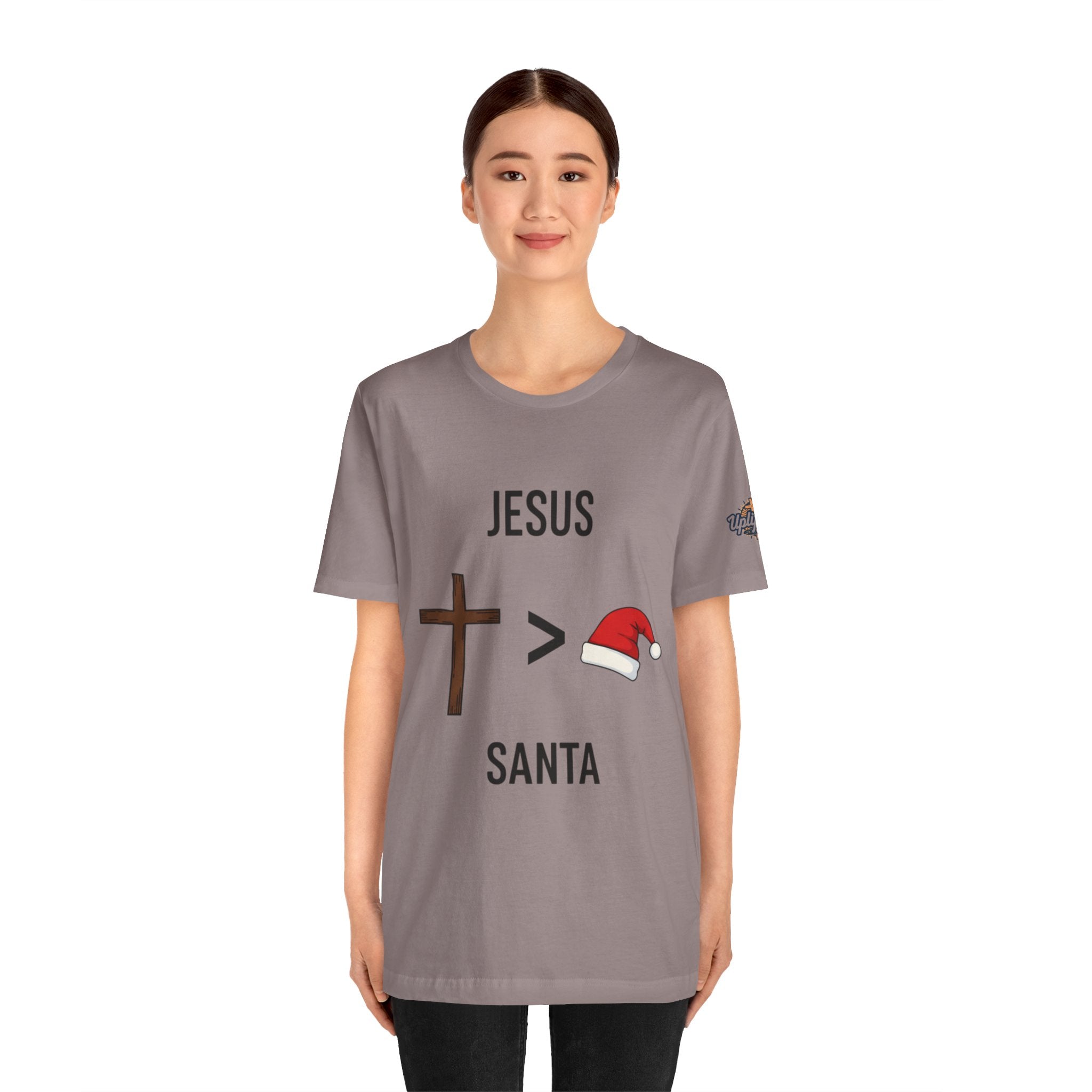 🎄 Jesus > Santa – Minimalist Christian Christmas T-Shirt | Bold Faith Over Holiday Tee | Cross vs Santa Hat Design | Uplifted Gear Printify