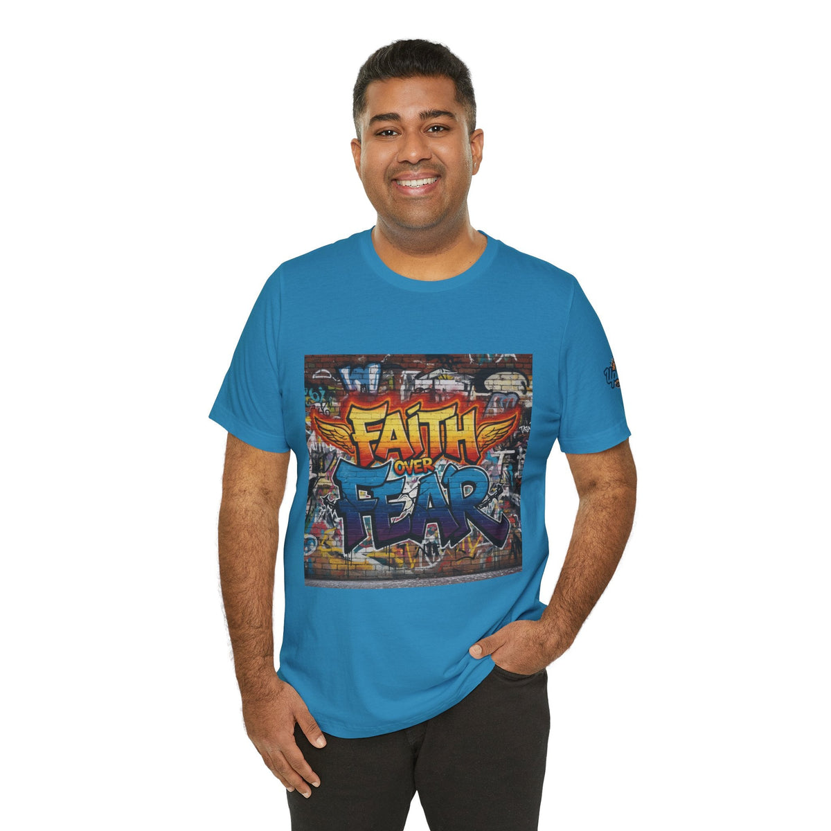 Faith Over Fear T-shirt – Graffiti Wall Christian T-shirt for Bold 2 Corinthians 5:7 Streetwear & Unshakable Faith Printify