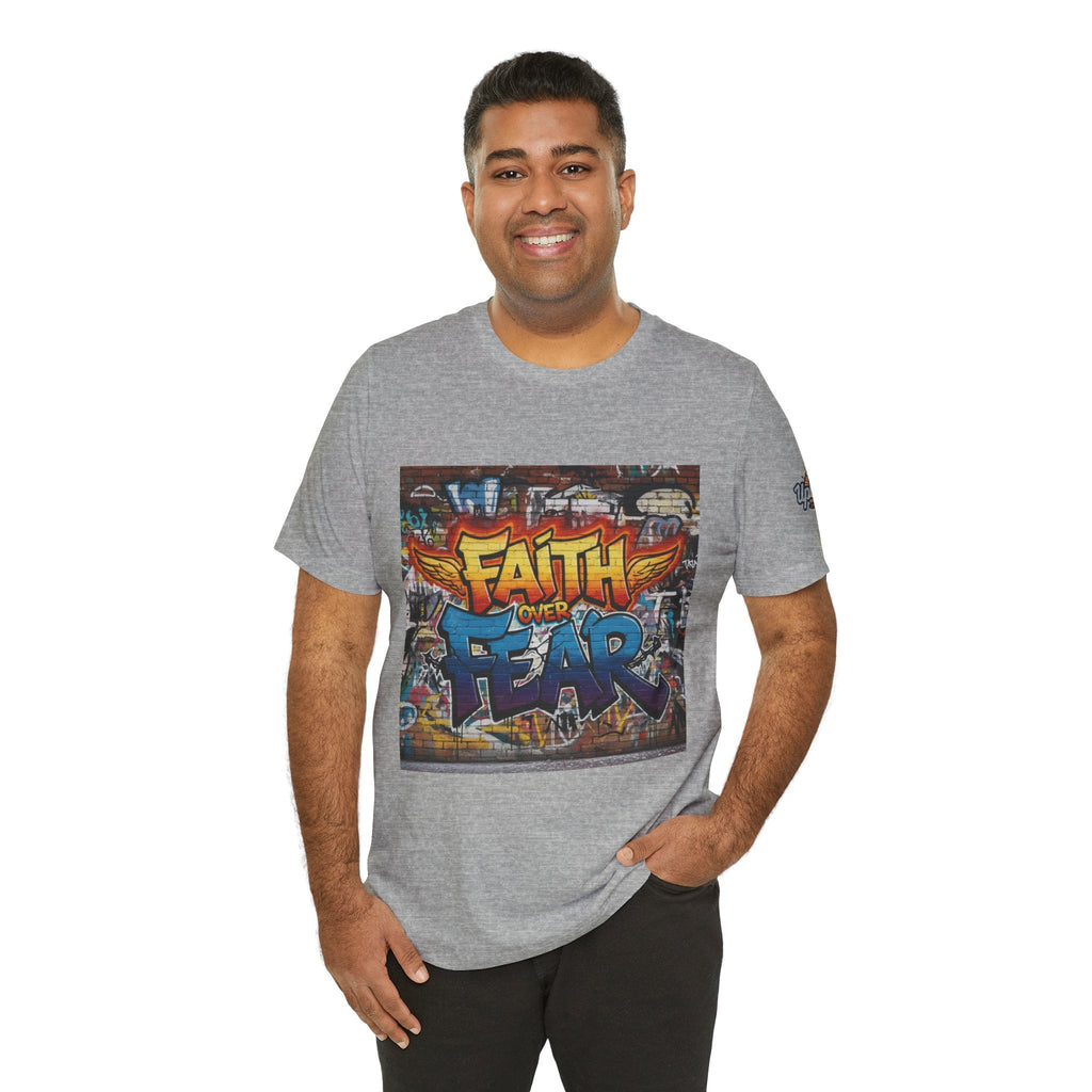 Faith Over Fear T-shirt – Graffiti Wall Christian T-shirt for Bold 2 Corinthians 5:7 Streetwear & Unshakable Faith Printify