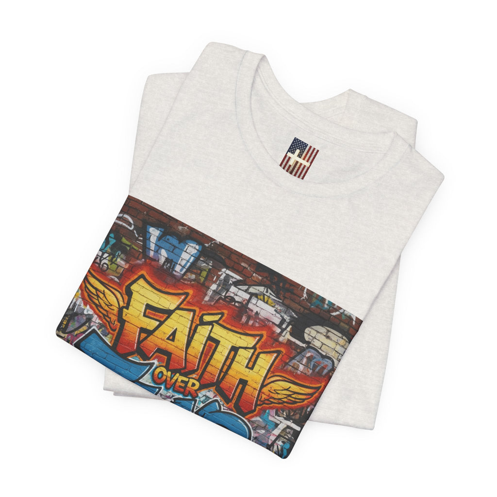 Faith Over Fear T-shirt – Graffiti Wall Christian T-shirt for Bold 2 Corinthians 5:7 Streetwear & Unshakable Faith Printify