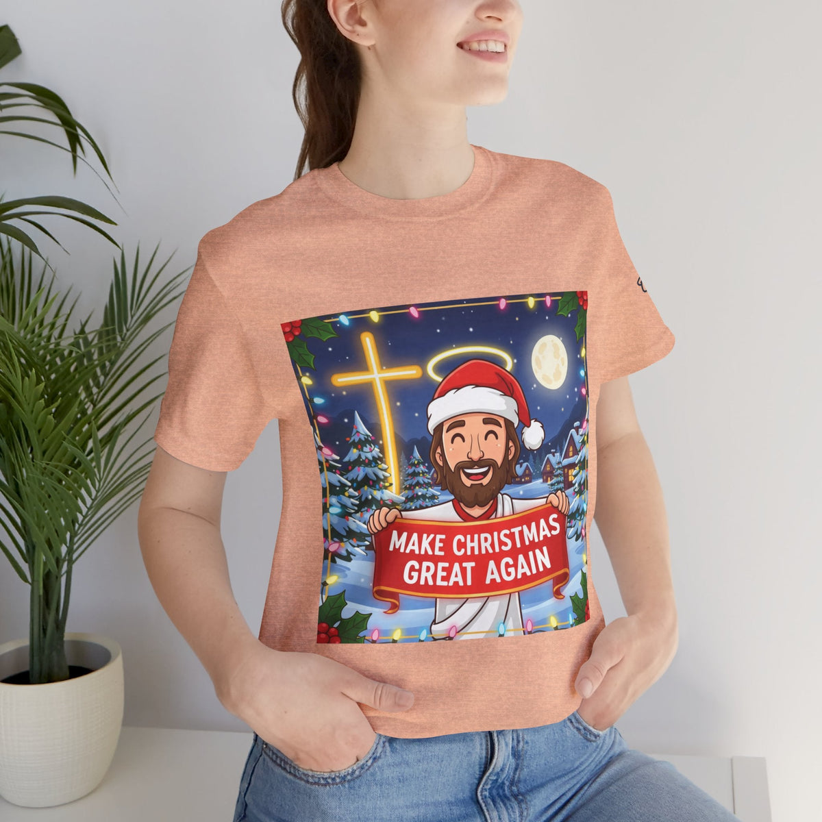 🎄 Make Christmas Great Again – Funny Christian T-Shirt | Jesus Holding Banner | Faith-Based Holiday Parody Tee | Uplifted Gear Printify