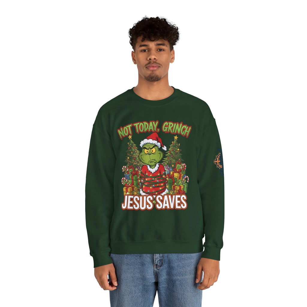 🎄 Not Today, Grinch – Jesus Saves | Funny Christian Christmas Sweatshirt | Sulking Grinch & Glowing Cross | Bold Neon Faith Tee by Uplifted Gear Printify