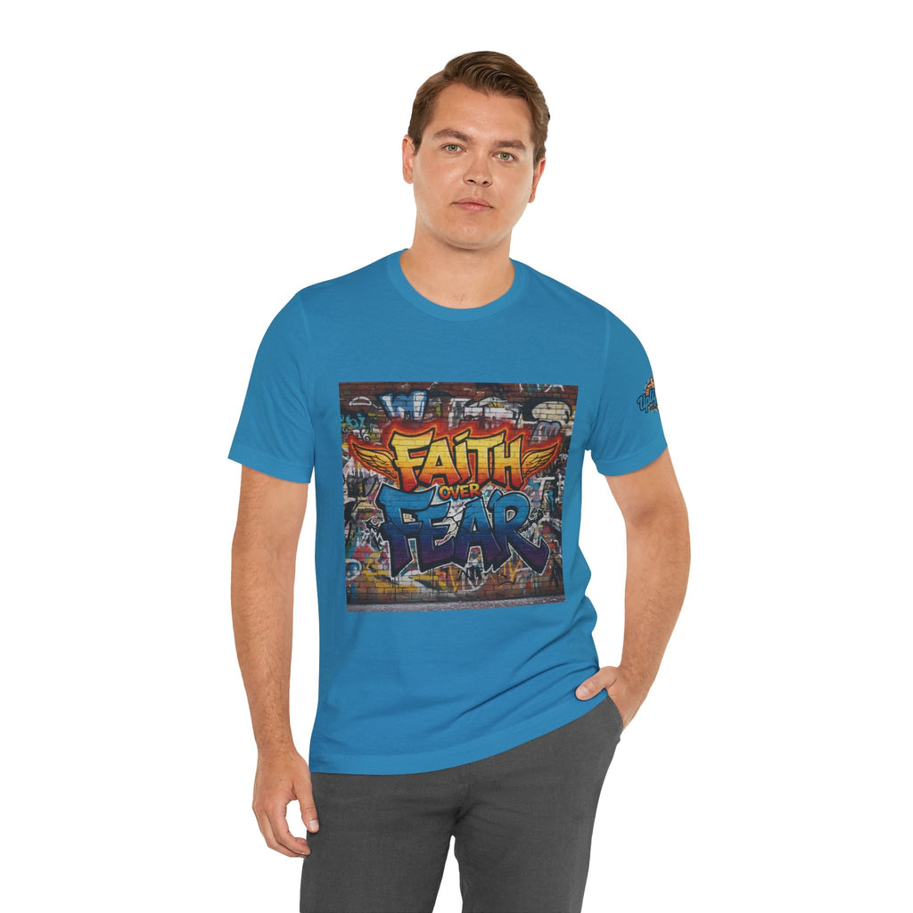 Faith Over Fear T-shirt – Graffiti Wall Christian T-shirt for Bold 2 Corinthians 5:7 Streetwear & Unshakable Faith Printify