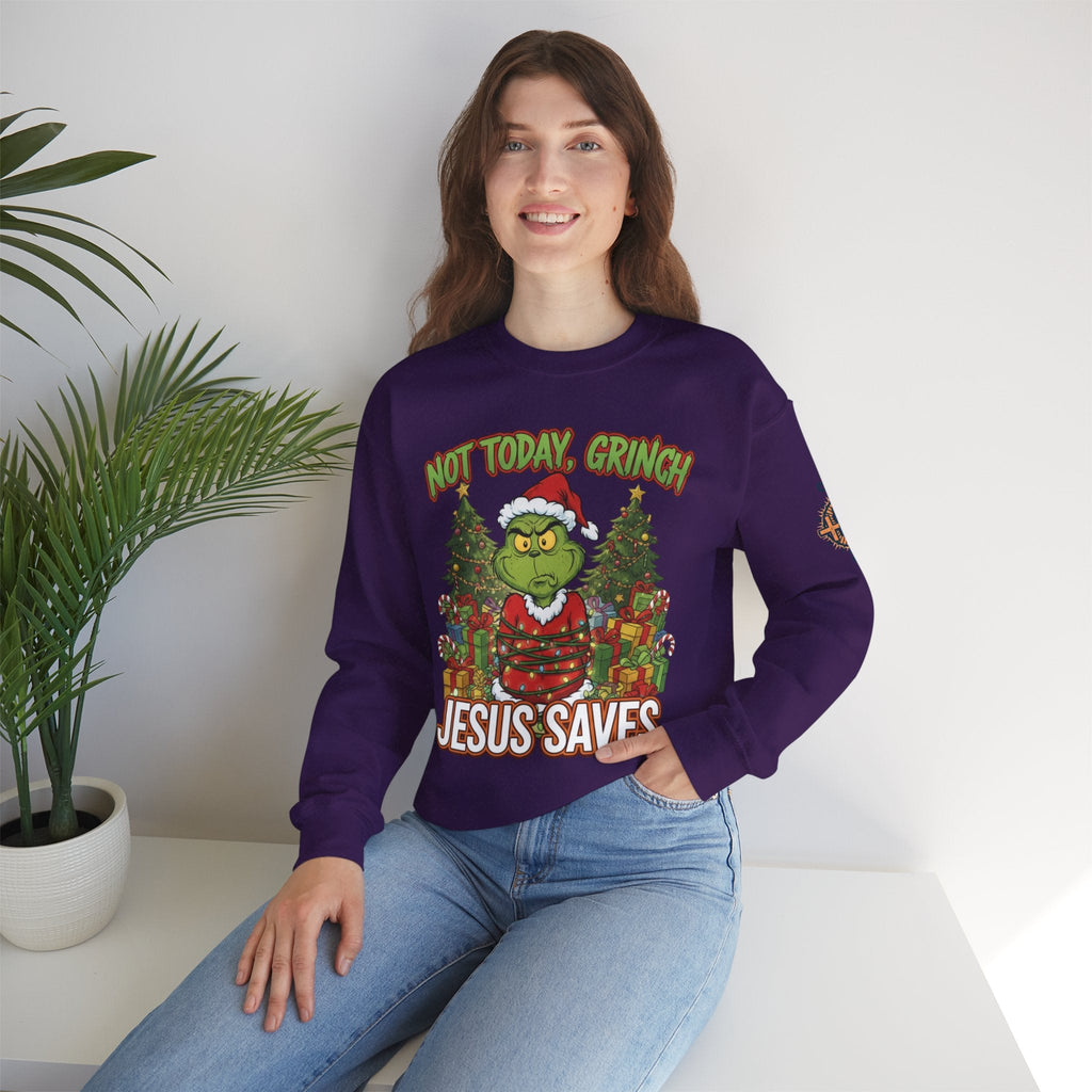 🎄 Not Today, Grinch – Jesus Saves | Funny Christian Christmas Sweatshirt | Sulking Grinch & Glowing Cross | Bold Neon Faith Tee by Uplifted Gear Printify