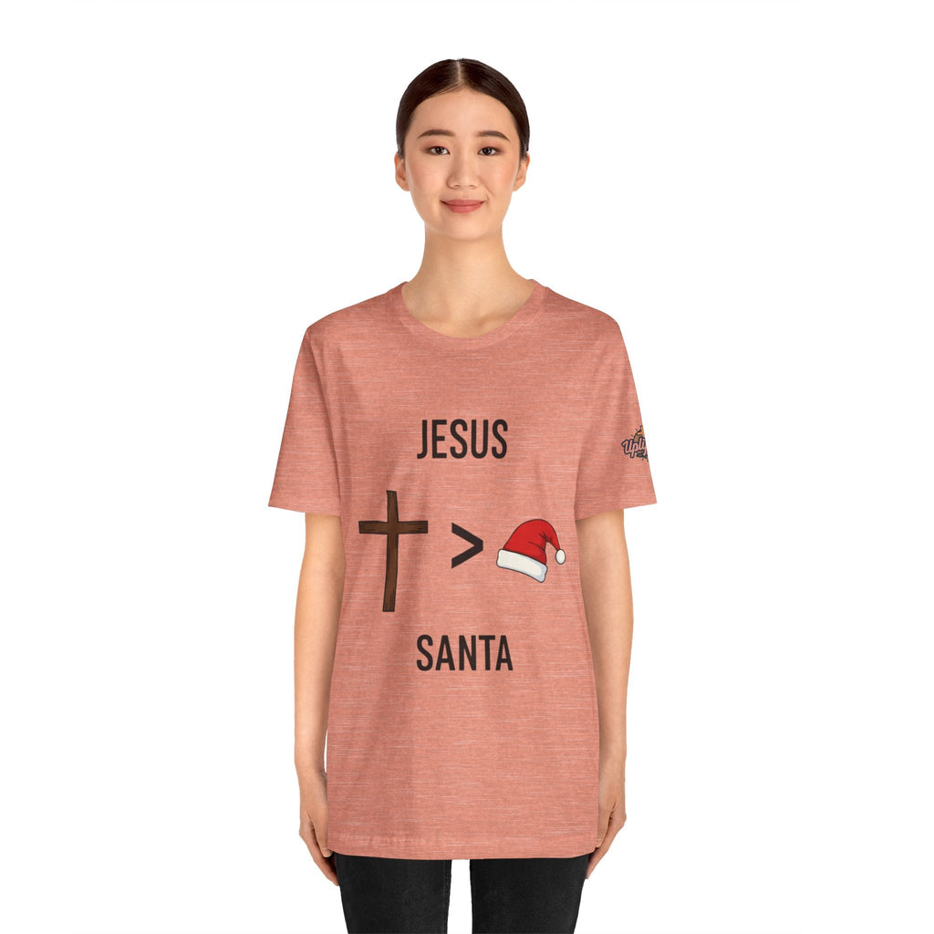🎄 Jesus > Santa – Minimalist Christian Christmas T-Shirt | Bold Faith Over Holiday Tee | Cross vs Santa Hat Design | Uplifted Gear Printify