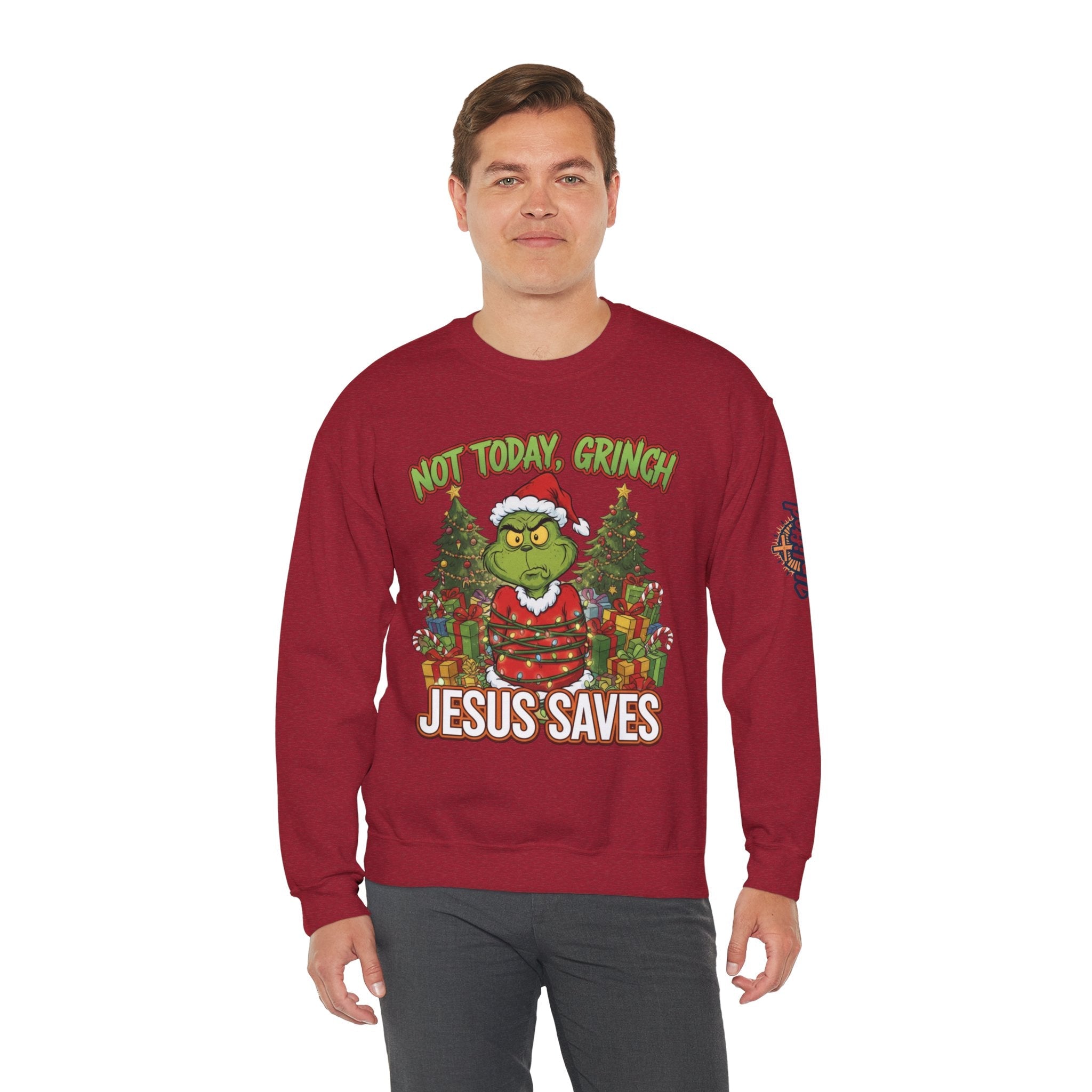 🎄 Not Today, Grinch – Jesus Saves | Funny Christian Christmas Sweatshirt | Sulking Grinch & Glowing Cross | Bold Neon Faith Tee by Uplifted Gear Printify
