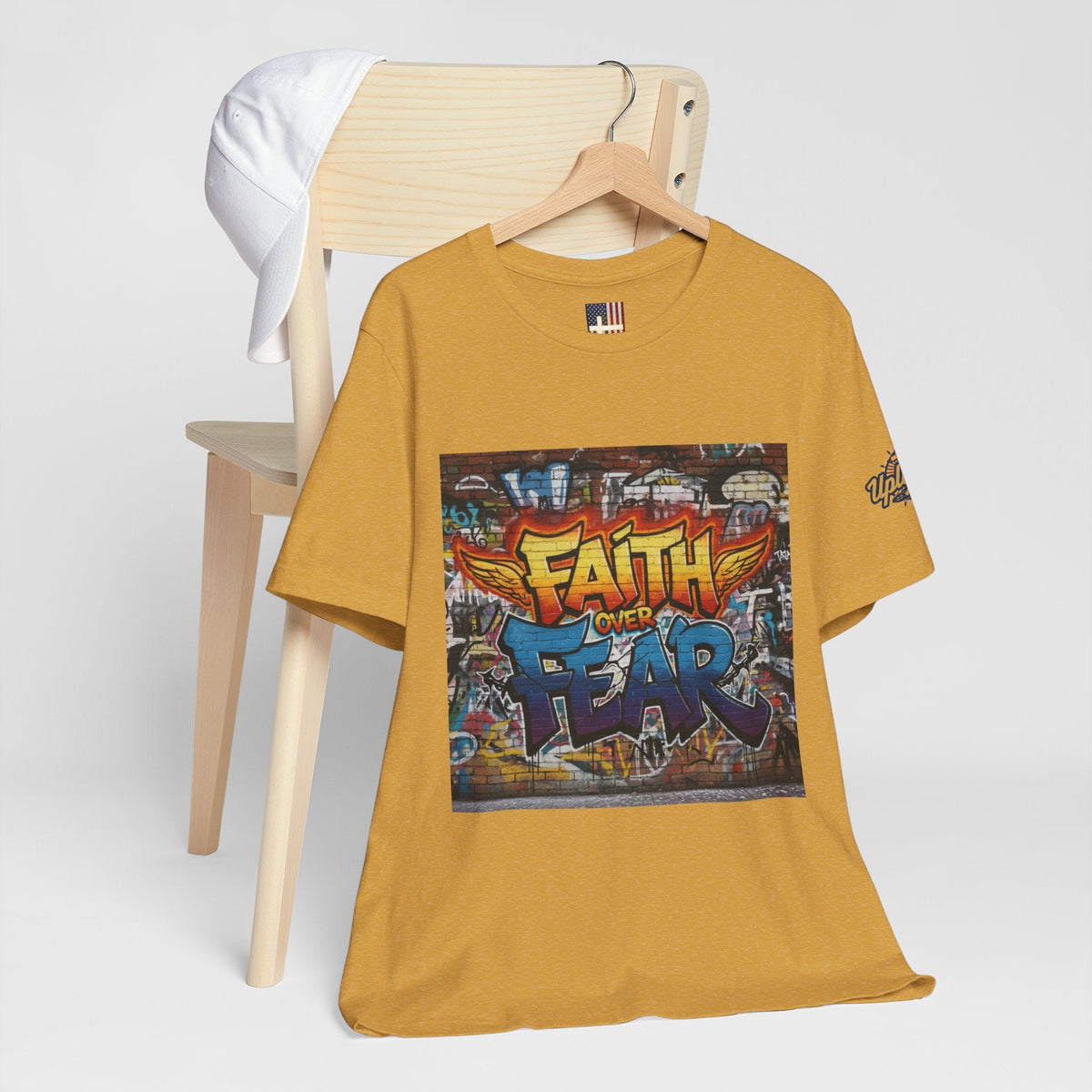 Faith Over Fear T-shirt – Graffiti Wall Christian T-shirt for Bold 2 Corinthians 5:7 Streetwear & Unshakable Faith Printify