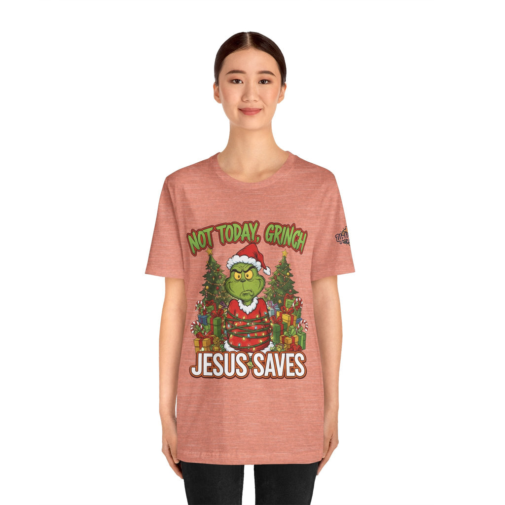 🎄 Not Today, Grinch – Jesus Saves | Funny Christian Christmas T-Shirt | Sulking Grinch & Glowing Cross | Bold Neon Faith Tee by Uplifted Gear Printify