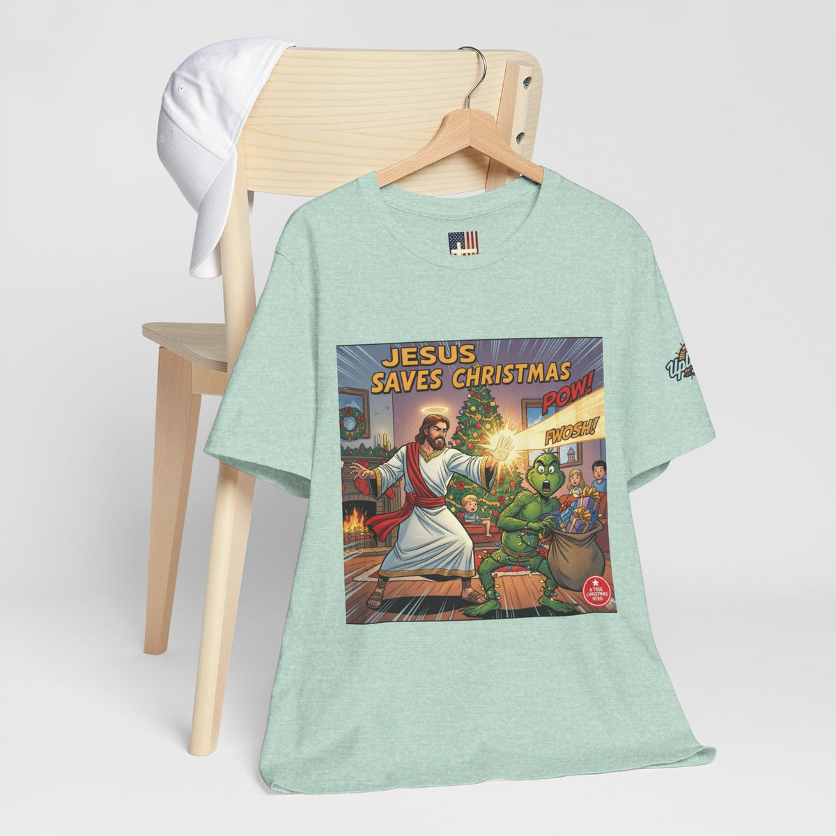 Jesus Saves Christmas T-shirt – Grinch vs Savior Light Battle Christian T-shirt for Hilarious Holiday Faith & True Joy Printify