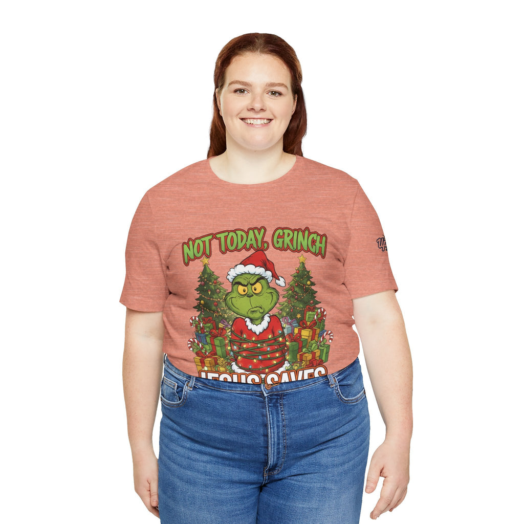 🎄 Not Today, Grinch – Jesus Saves | Funny Christian Christmas T-Shirt | Sulking Grinch & Glowing Cross | Bold Neon Faith Tee by Uplifted Gear Printify