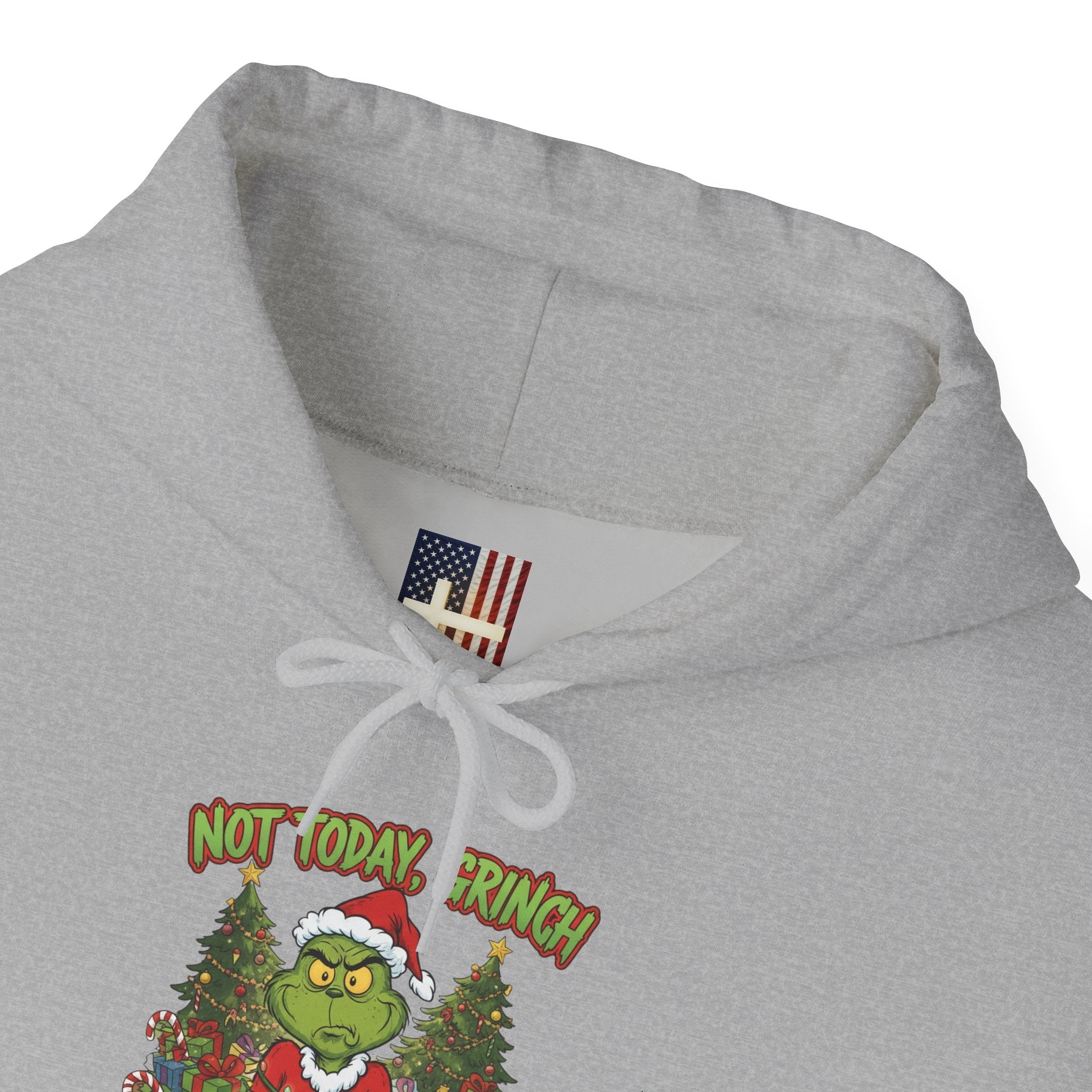 🎄 Not Today, Grinch – Jesus Saves | Funny Christian Christmas Hoodie | Sulking Grinch & Glowing Cross | Bold Neon Faith Tee by Uplifted Gear Printify