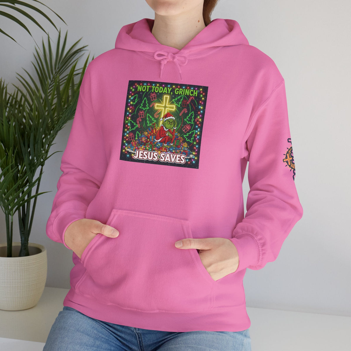 🎄 Not Today, Grinch – Jesus Saves | Funny Christian Christmas Hoodie | Festive Green & Red Cartoon Style | Bold Faith Holiday Tee by Uplifted Gear Printify