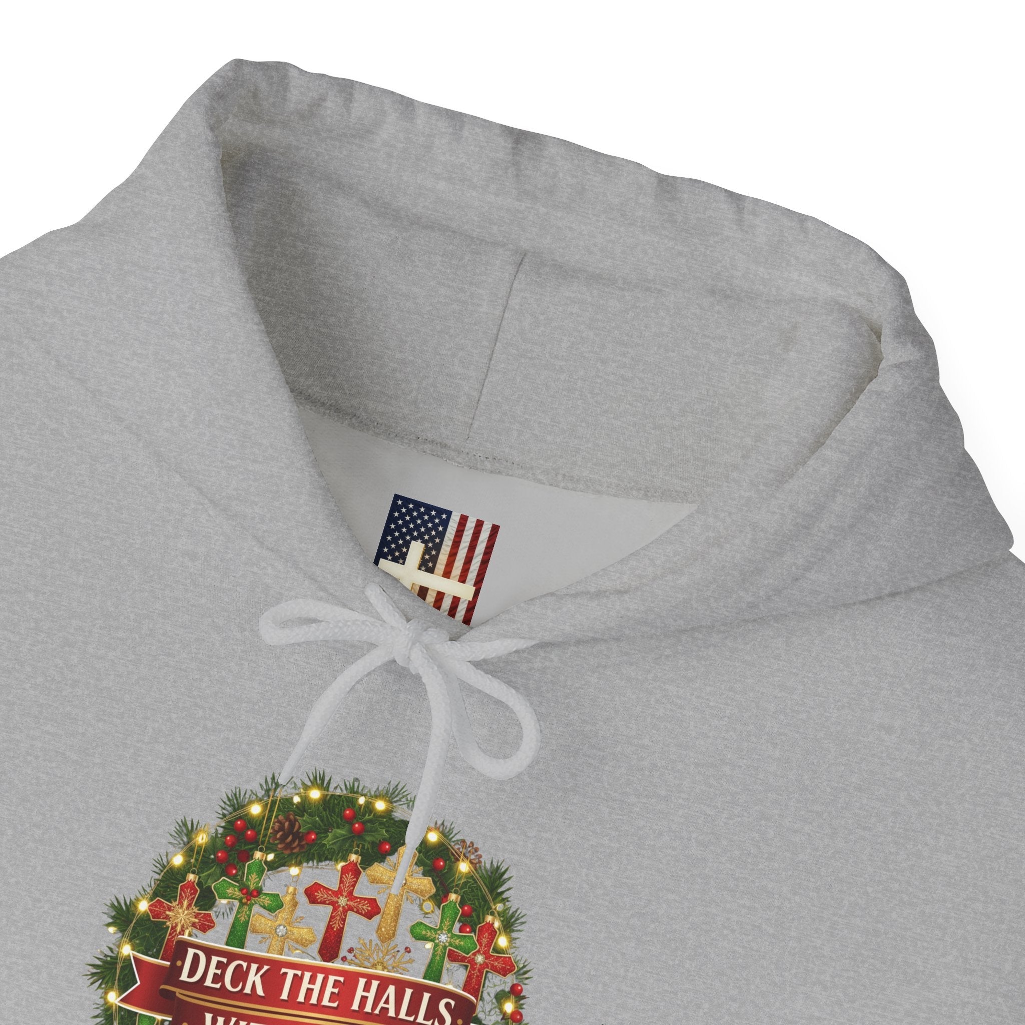 🎄 Deck the Halls with Faith – Christian Christmas Hoodie | Cross Ornament Design & Festive Garland | Bold Holiday Faith Tee by Uplifted Gear Printify