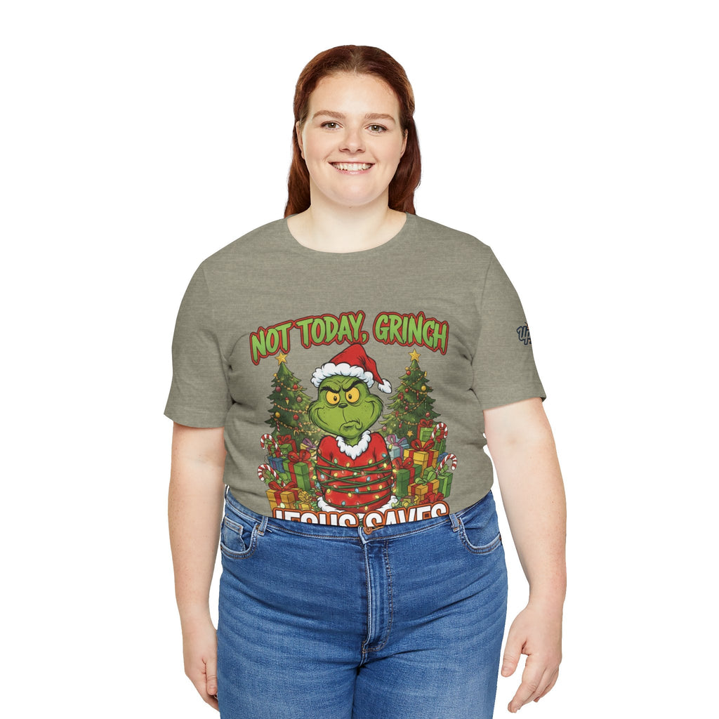 🎄 Not Today, Grinch – Jesus Saves | Funny Christian Christmas T-Shirt | Sulking Grinch & Glowing Cross | Bold Neon Faith Tee by Uplifted Gear Printify