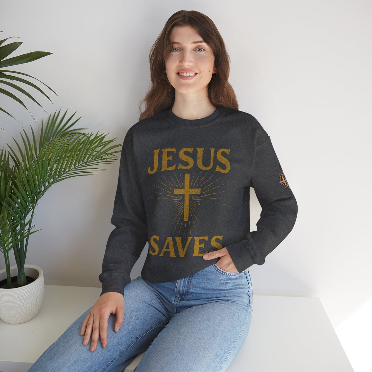 Jesus Saves Sweatshirt – Radiant Cross & Rays of Light Christian Sweatshirt for Eternal Hope & Faith Printify