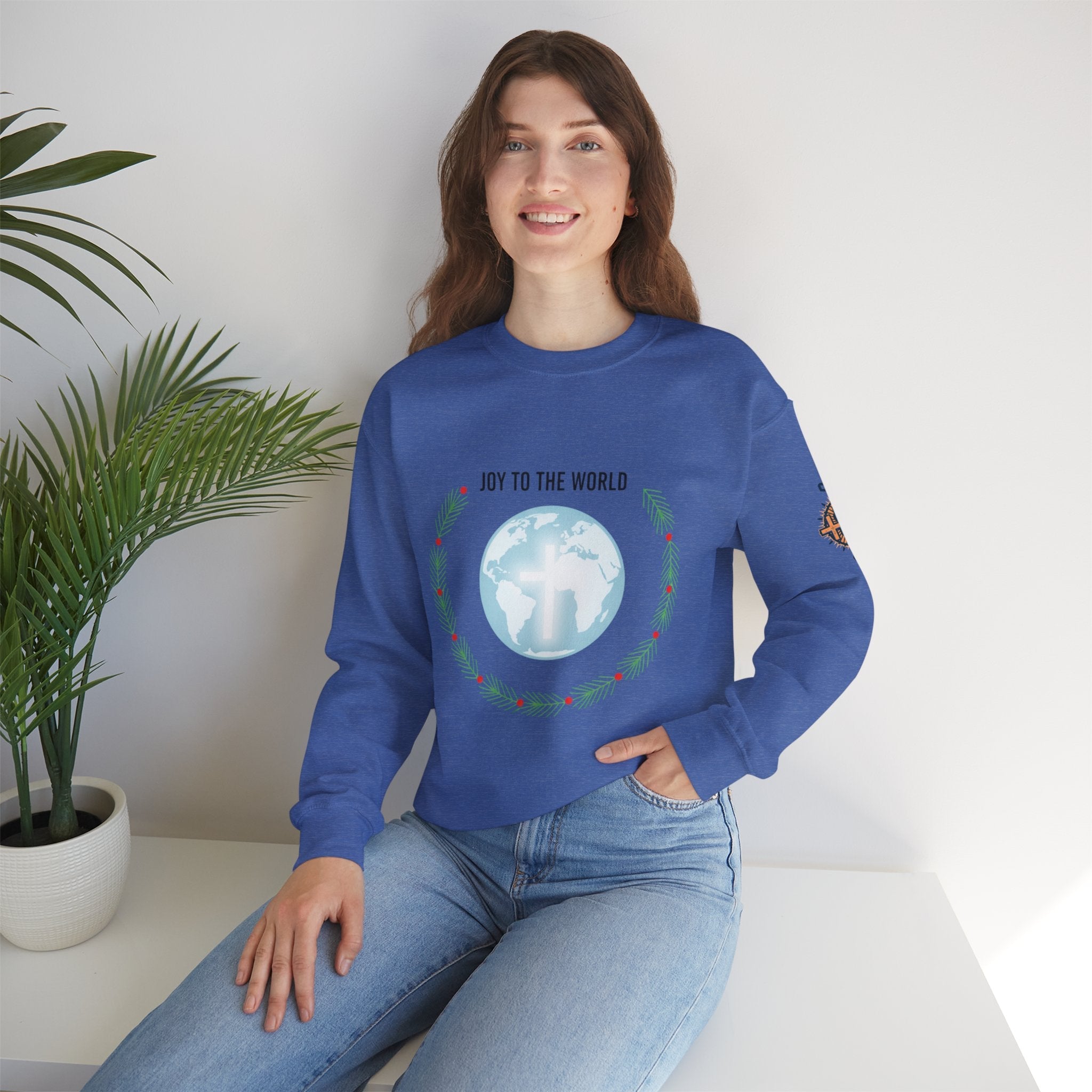 Joy to the World Sweatshirt – Wreath Earth Nativity Christian Christmas Sweatshirt for Isaiah 9:6 Holiday Faith & Festive Joy Printify
