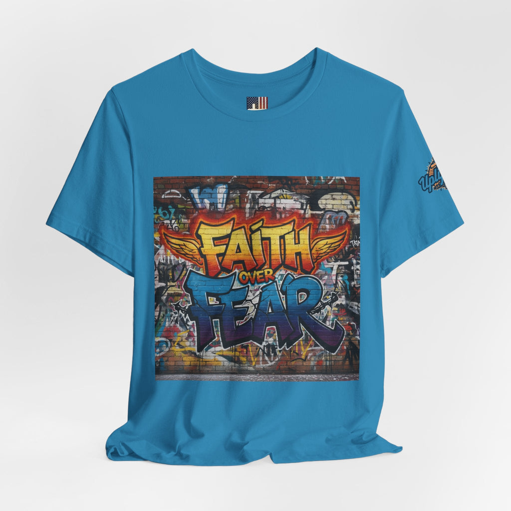 Faith Over Fear T-shirt – Graffiti Wall Christian T-shirt for Bold 2 Corinthians 5:7 Streetwear & Unshakable Faith Printify