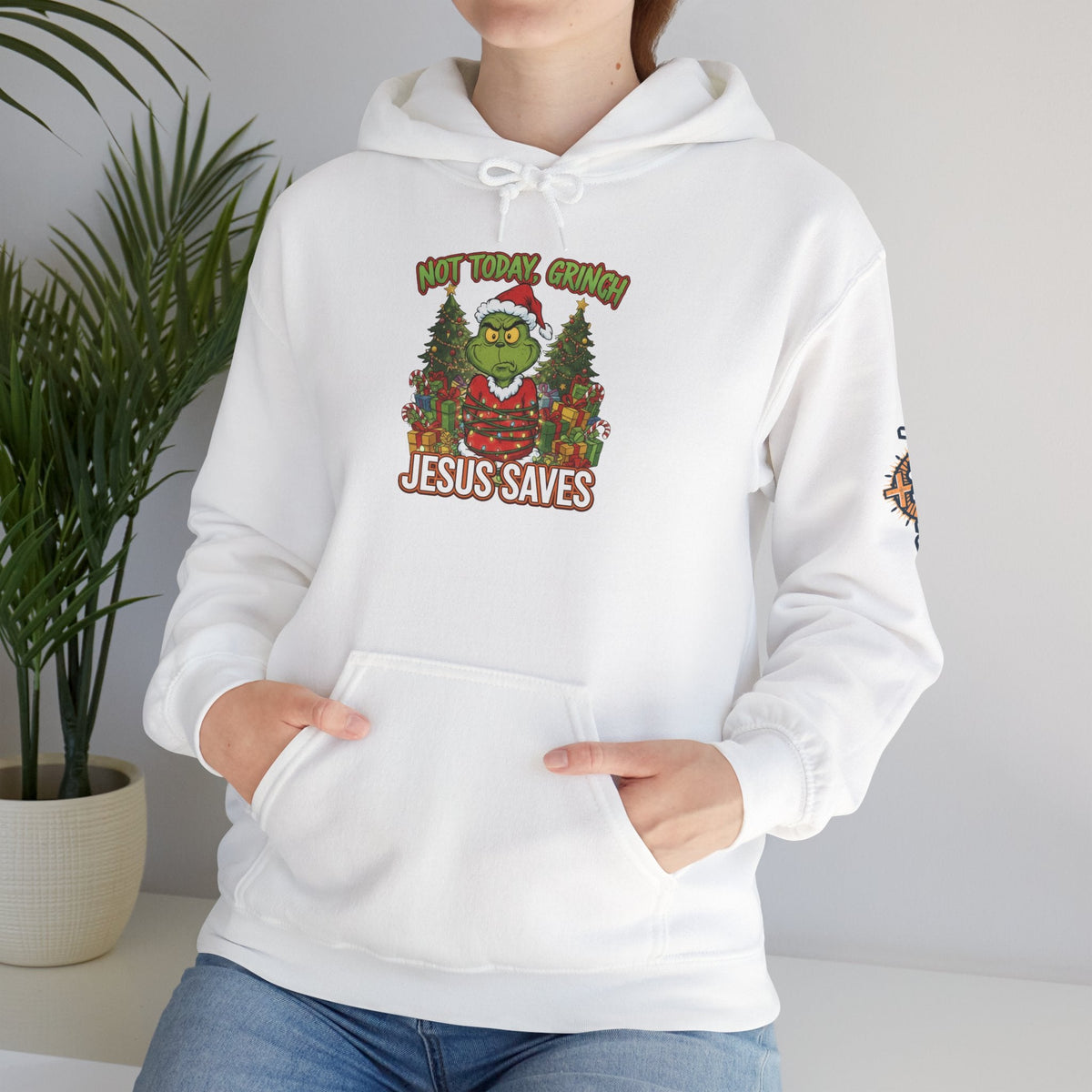 🎄 Not Today, Grinch – Jesus Saves | Funny Christian Christmas Hoodie | Sulking Grinch & Glowing Cross | Bold Neon Faith Tee by Uplifted Gear Printify