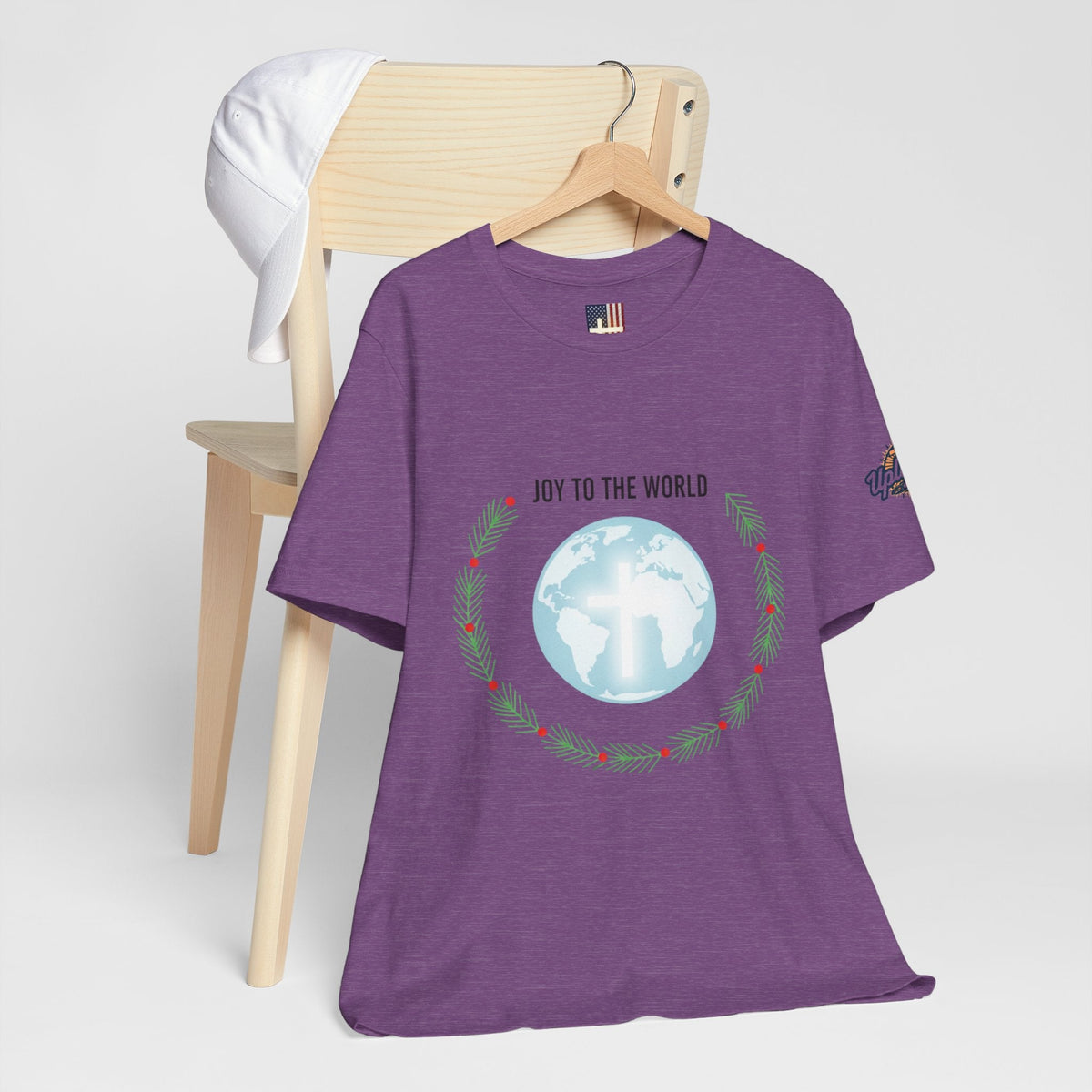 Joy to the World T-shirt – Wreath Earth Nativity Christian Christmas T-shirt for Isaiah 9:6 Holiday Faith & Festive Joy Printify