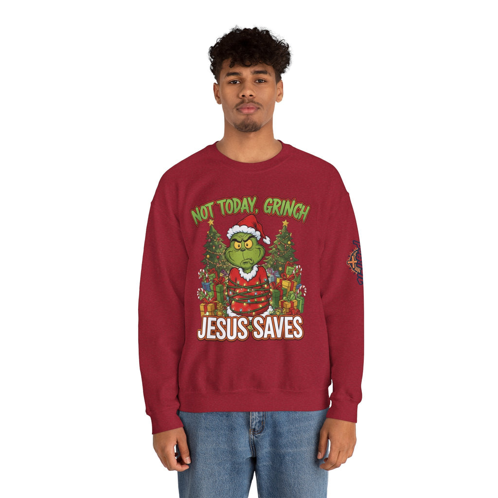 🎄 Not Today, Grinch – Jesus Saves | Funny Christian Christmas Sweatshirt | Sulking Grinch & Glowing Cross | Bold Neon Faith Tee by Uplifted Gear Printify