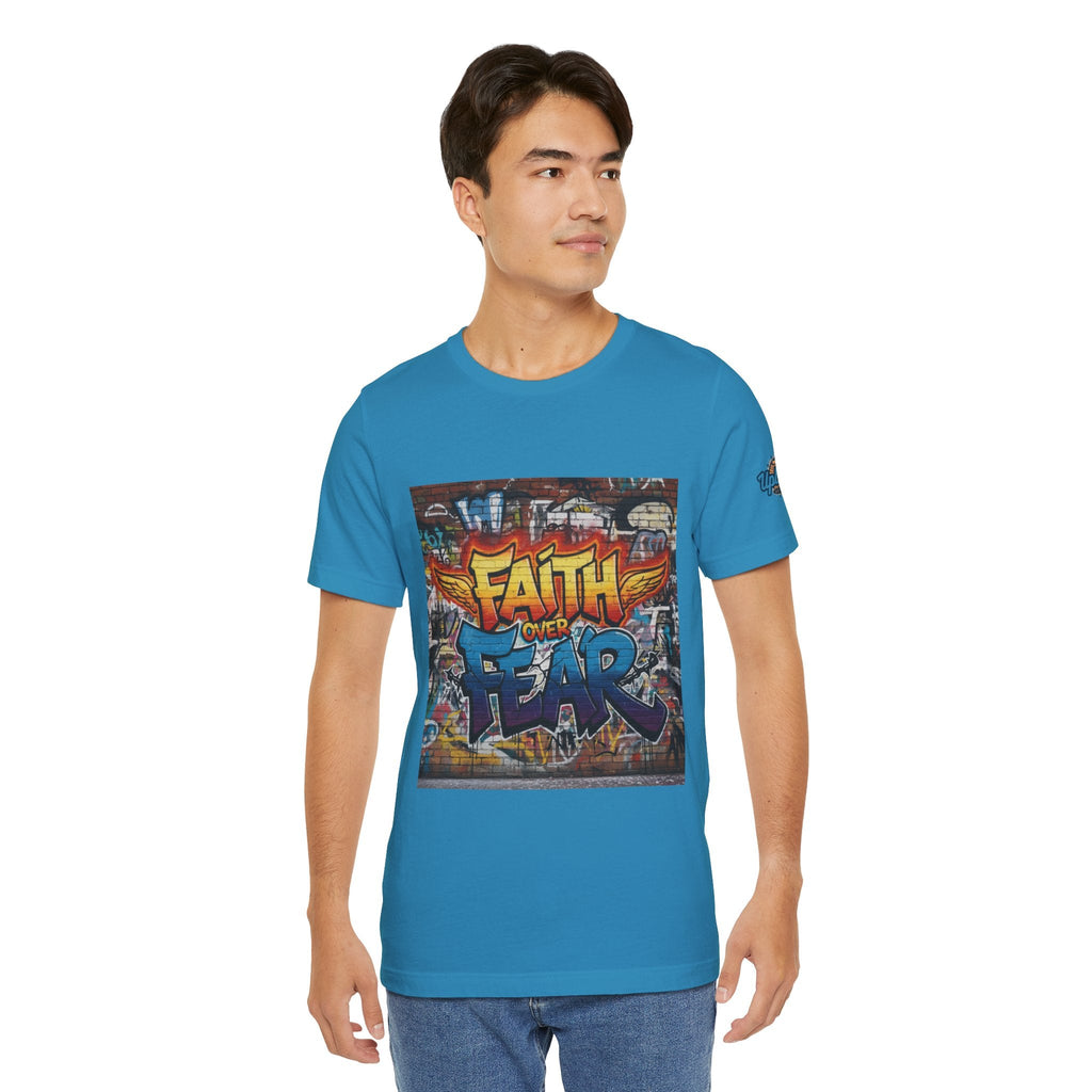 Faith Over Fear T-shirt – Graffiti Wall Christian T-shirt for Bold 2 Corinthians 5:7 Streetwear & Unshakable Faith Printify