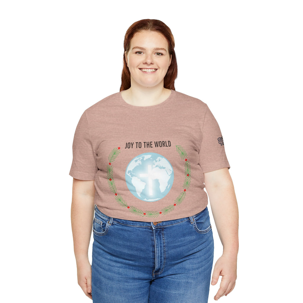 Joy to the World T-shirt – Wreath Earth Nativity Christian Christmas T-shirt for Isaiah 9:6 Holiday Faith & Festive Joy Printify