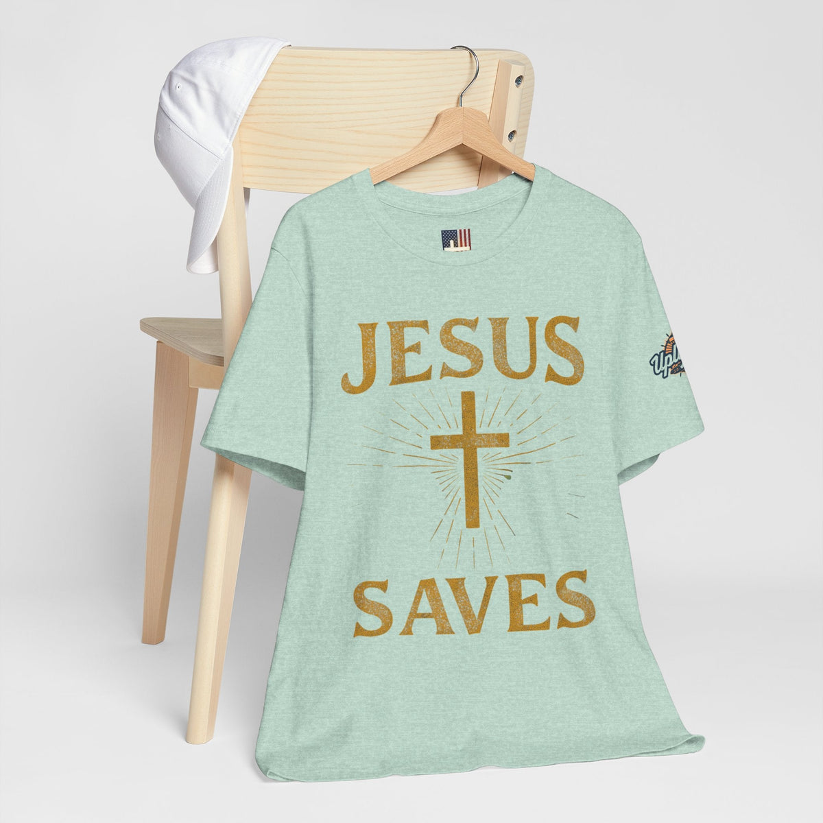 Jesus Saves T-shirt – Radiant Cross & Rays of Light Christian T-shirt for Eternal Hope & Faith Printify