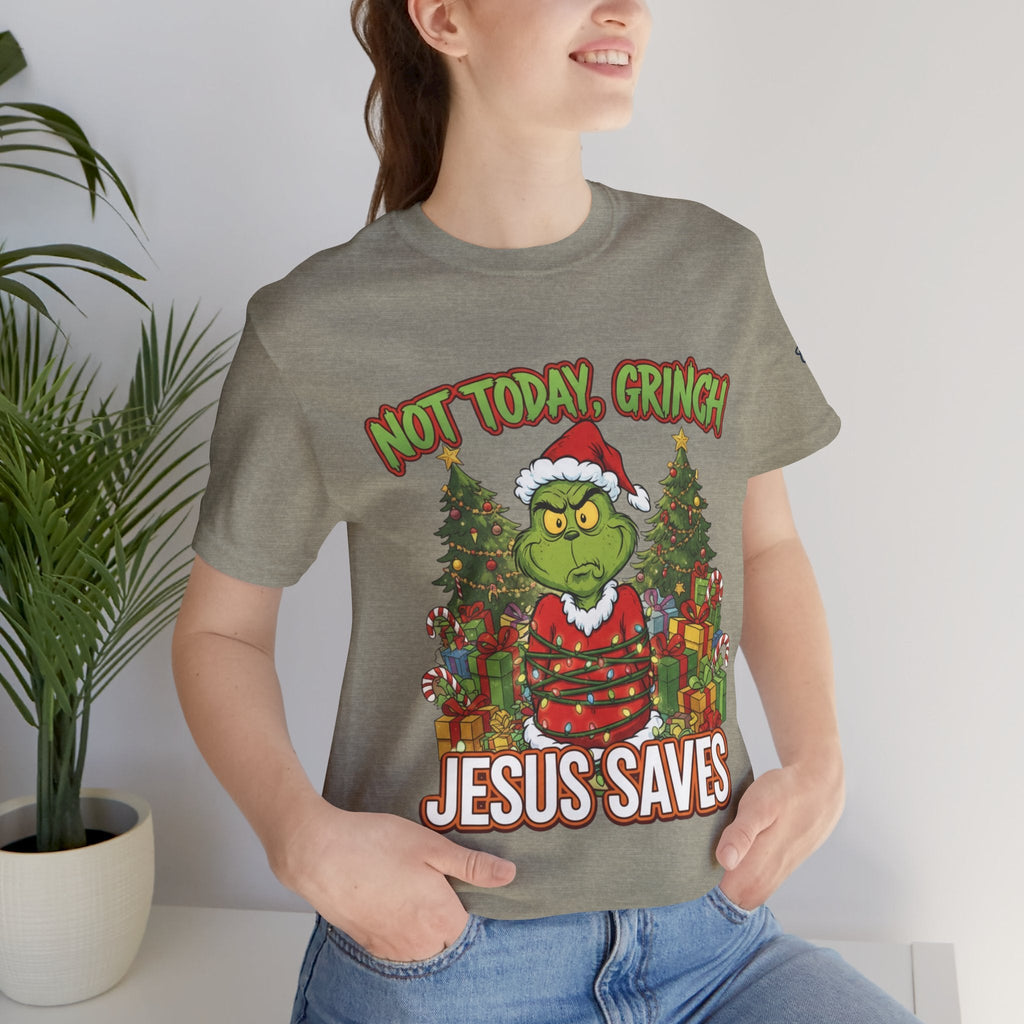 🎄 Not Today, Grinch – Jesus Saves | Funny Christian Christmas T-Shirt | Sulking Grinch & Glowing Cross | Bold Neon Faith Tee by Uplifted Gear Printify