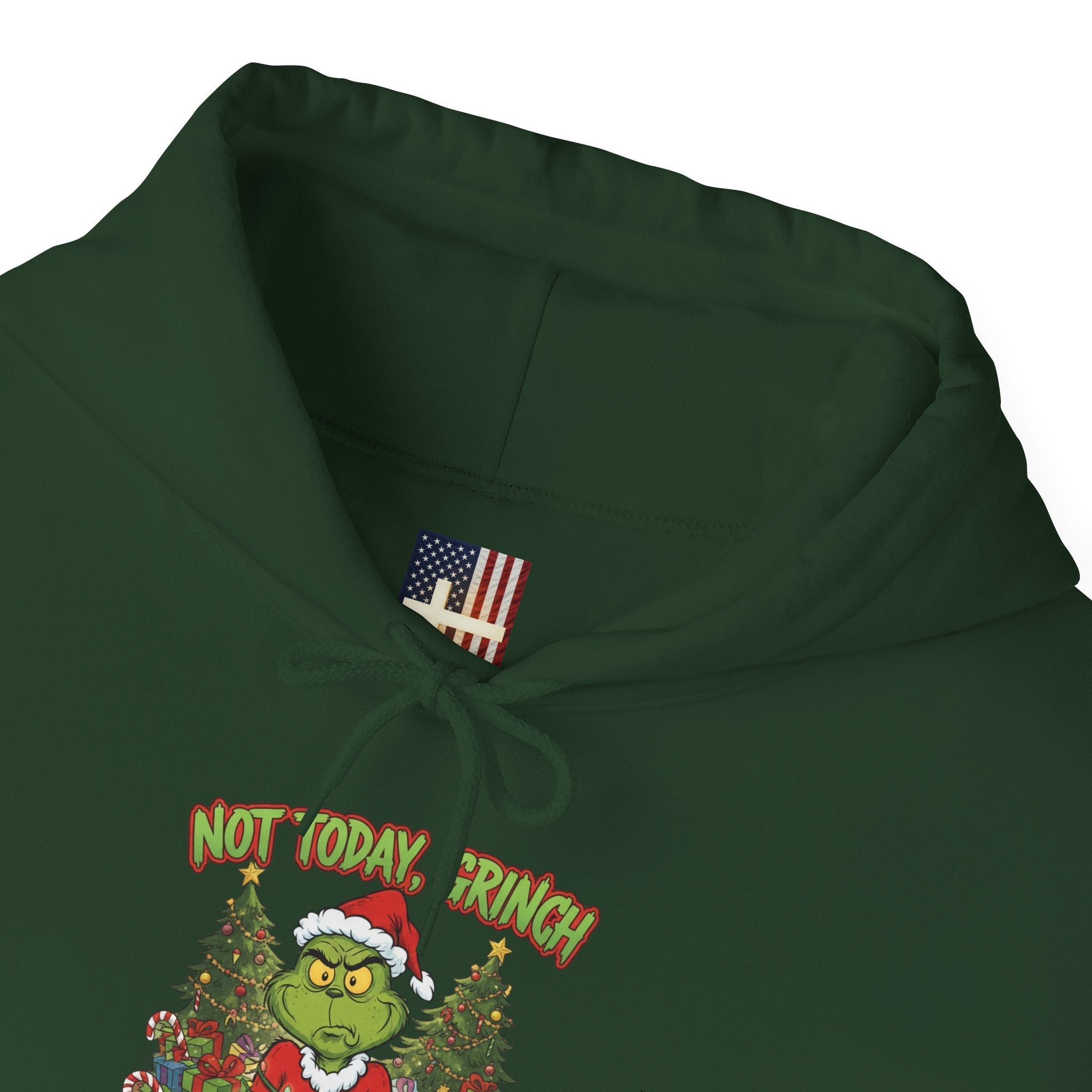 🎄 Not Today, Grinch – Jesus Saves | Funny Christian Christmas Hoodie | Sulking Grinch & Glowing Cross | Bold Neon Faith Tee by Uplifted Gear Printify