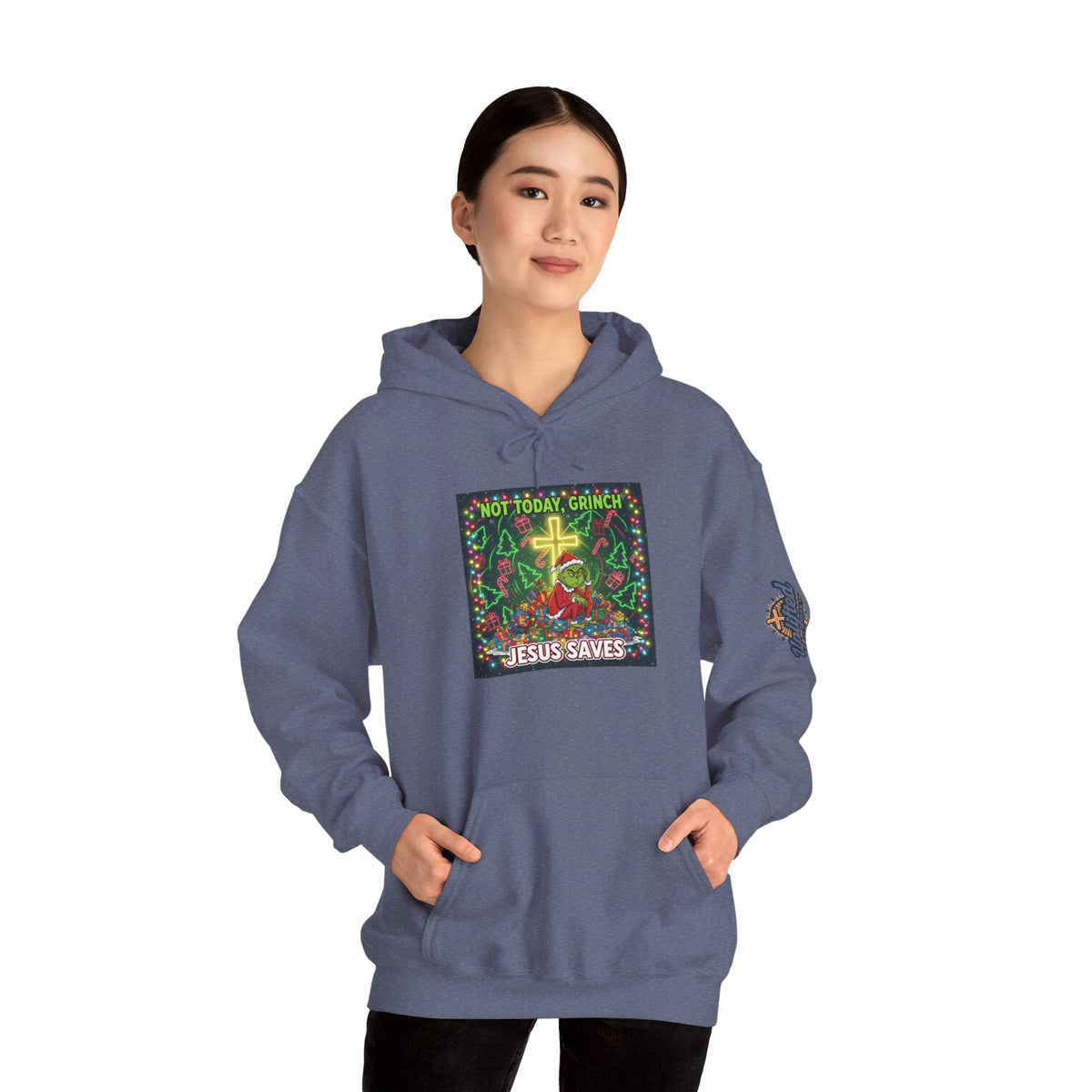 🎄 Not Today, Grinch – Jesus Saves | Funny Christian Christmas Hoodie | Festive Green & Red Cartoon Style | Bold Faith Holiday Tee by Uplifted Gear Printify