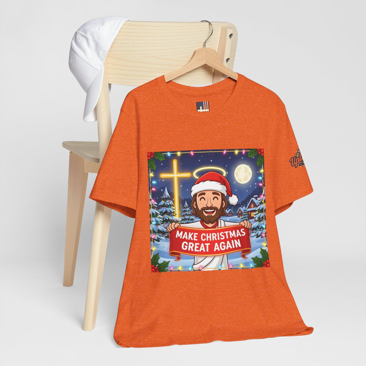 🎄 Make Christmas Great Again – Funny Christian T-Shirt | Jesus Holding Banner | Faith-Based Holiday Parody Tee | Uplifted Gear Printify