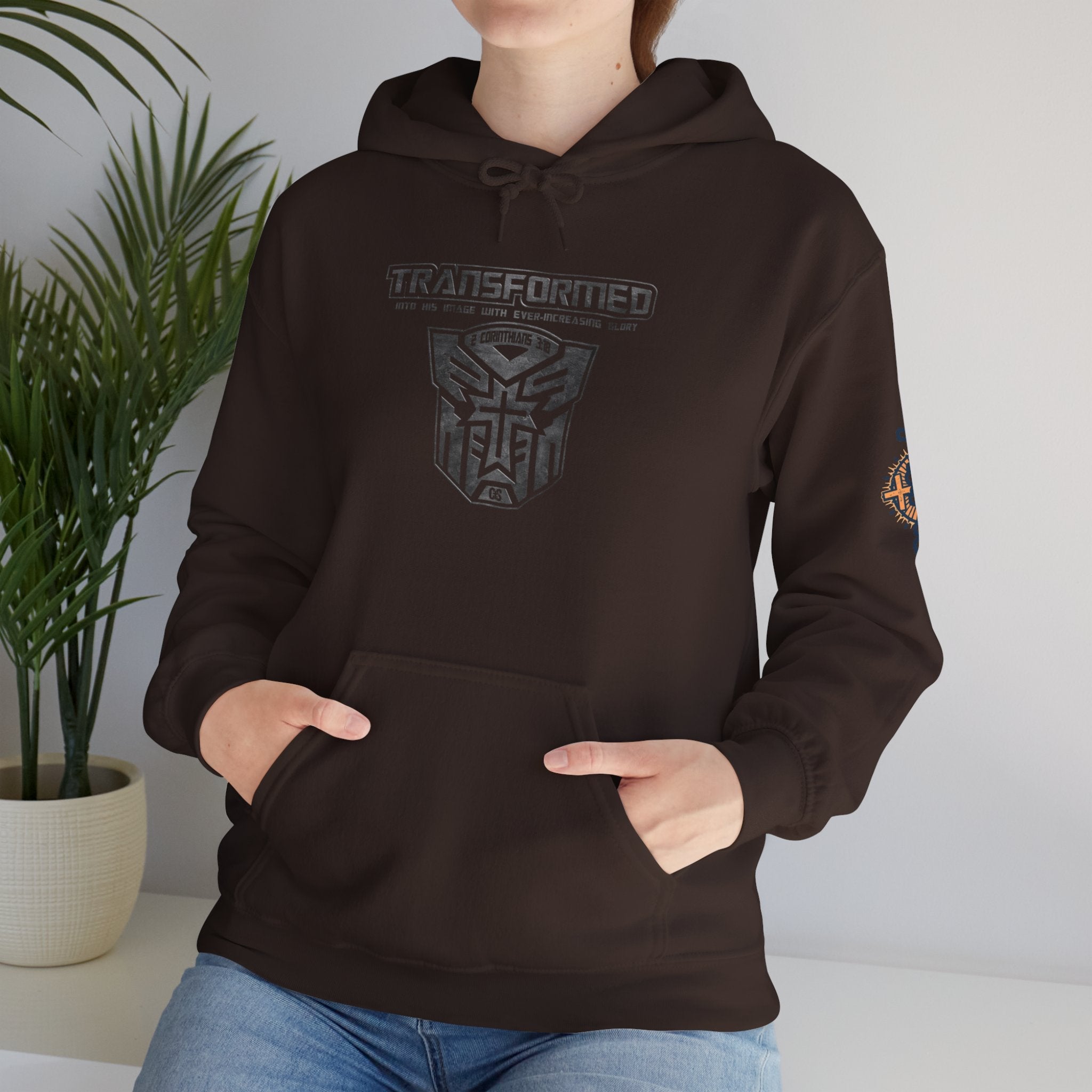 Transformer Logo Christian Hoodie | 2 Corinthians 3:18 Bible Verse Hoodie Printify