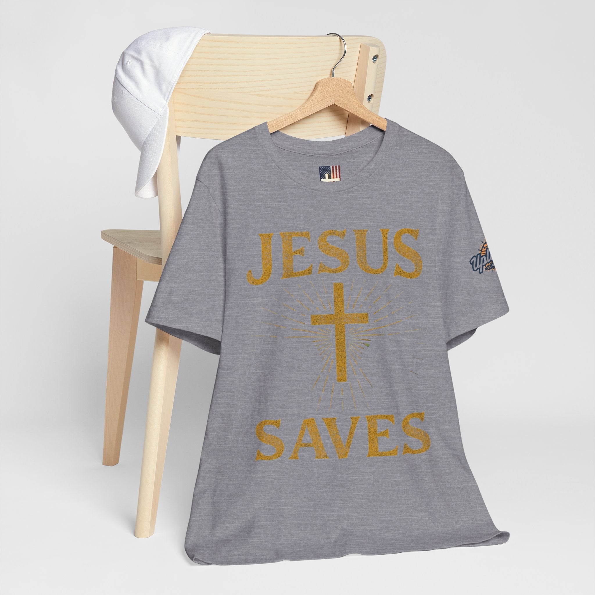 Jesus Saves T-shirt – Radiant Cross & Rays of Light Christian T-shirt for Eternal Hope & Faith Printify
