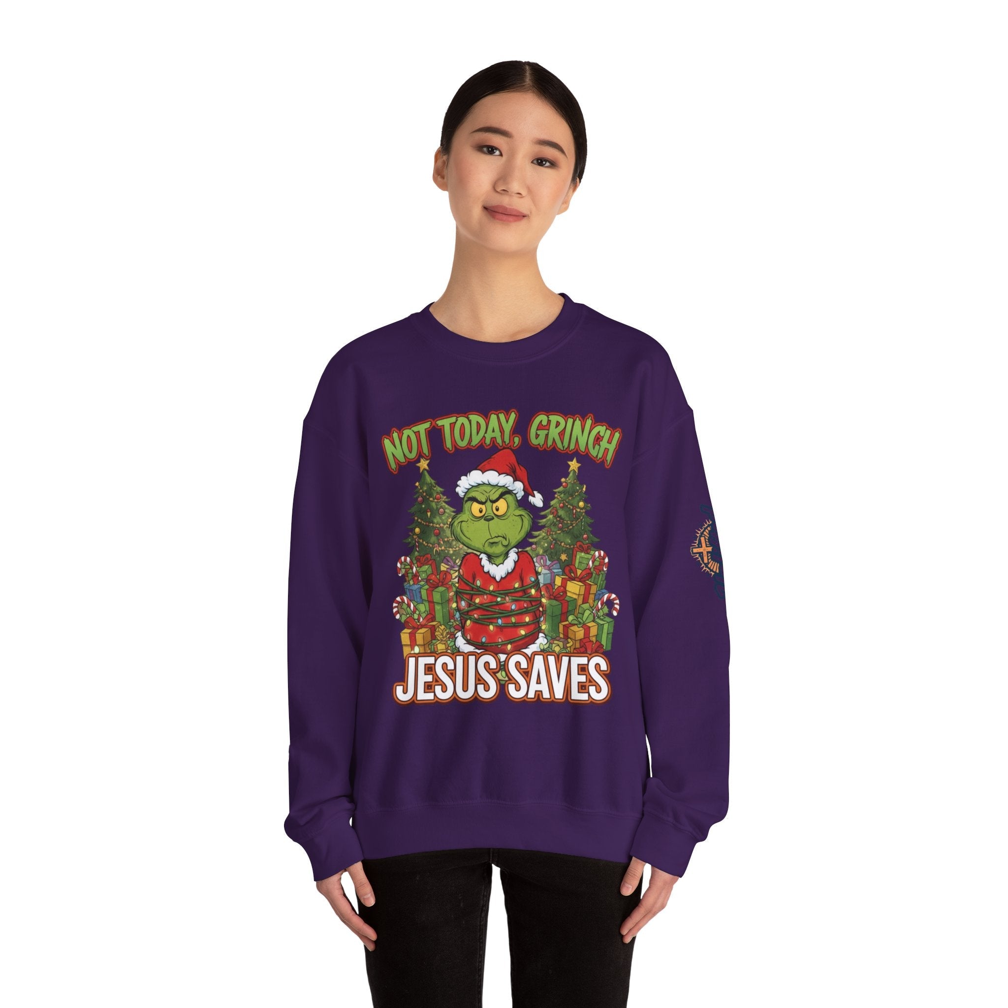 🎄 Not Today, Grinch – Jesus Saves | Funny Christian Christmas Sweatshirt | Sulking Grinch & Glowing Cross | Bold Neon Faith Tee by Uplifted Gear Printify