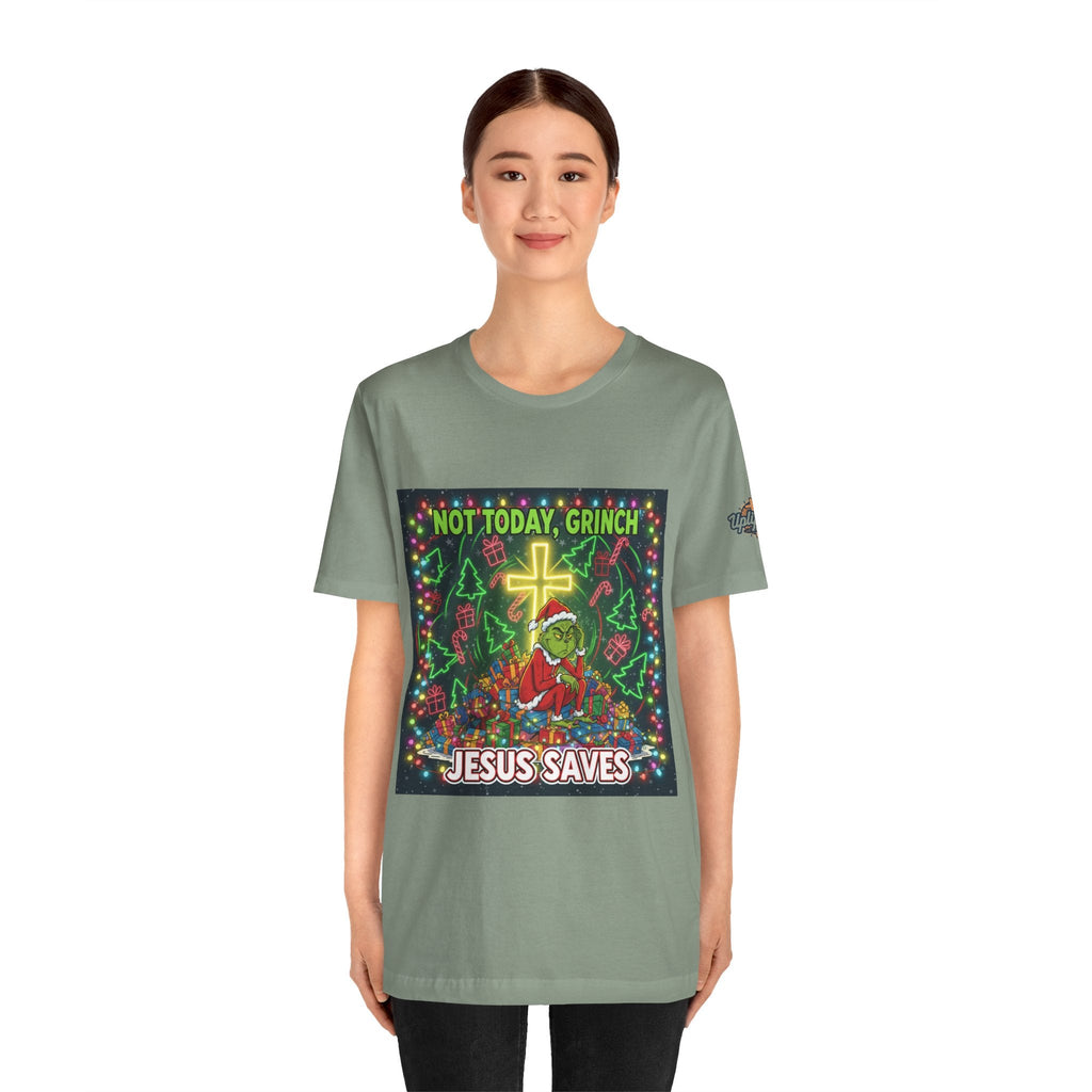 🎄 Not Today, Grinch – Jesus Saves | Funny Christian Christmas T-Shirt | Festive Green & Red Cartoon Style | Bold Faith Holiday Tee by Uplifted Gear Printify
