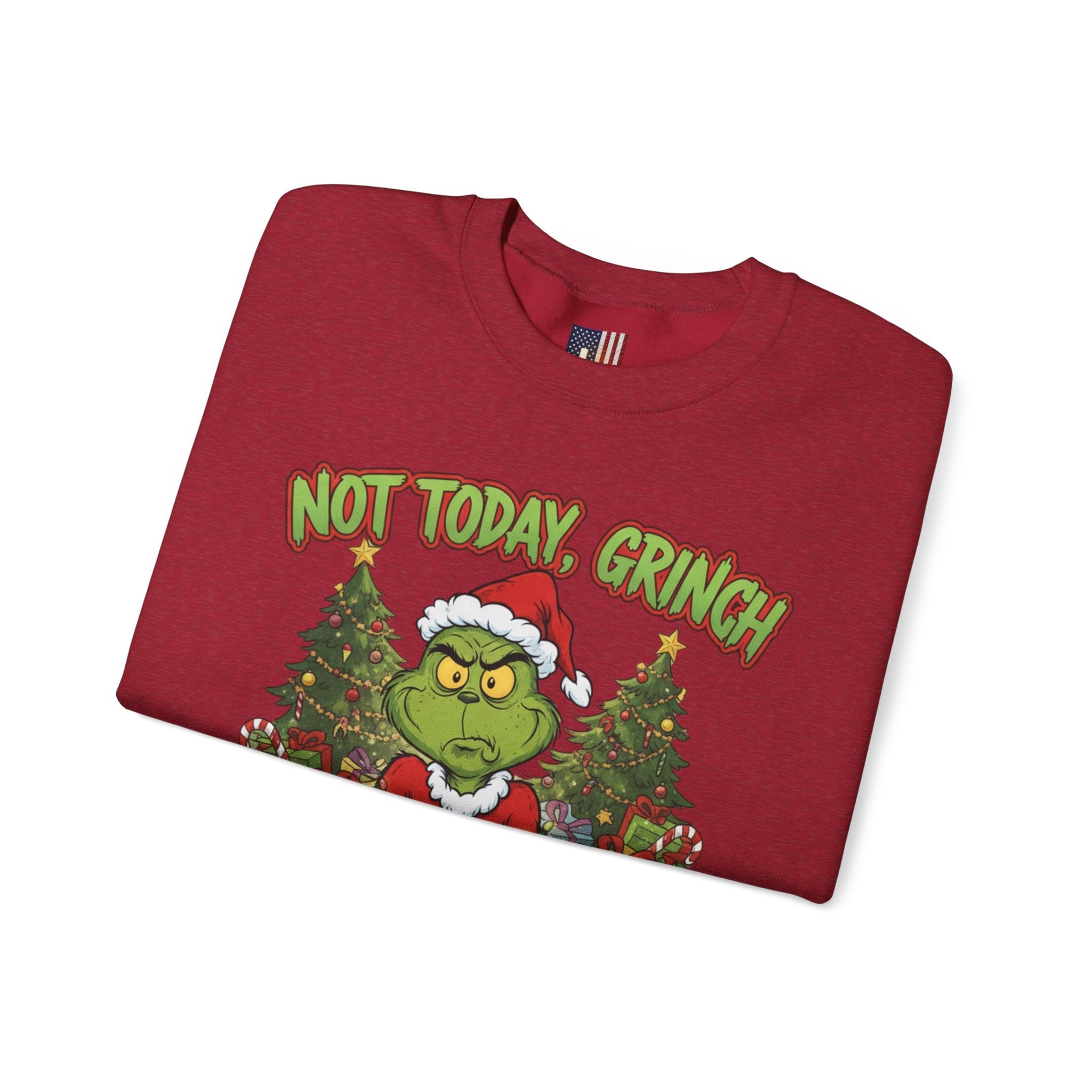 🎄 Not Today, Grinch – Jesus Saves | Funny Christian Christmas Sweatshirt | Sulking Grinch & Glowing Cross | Bold Neon Faith Tee by Uplifted Gear Printify