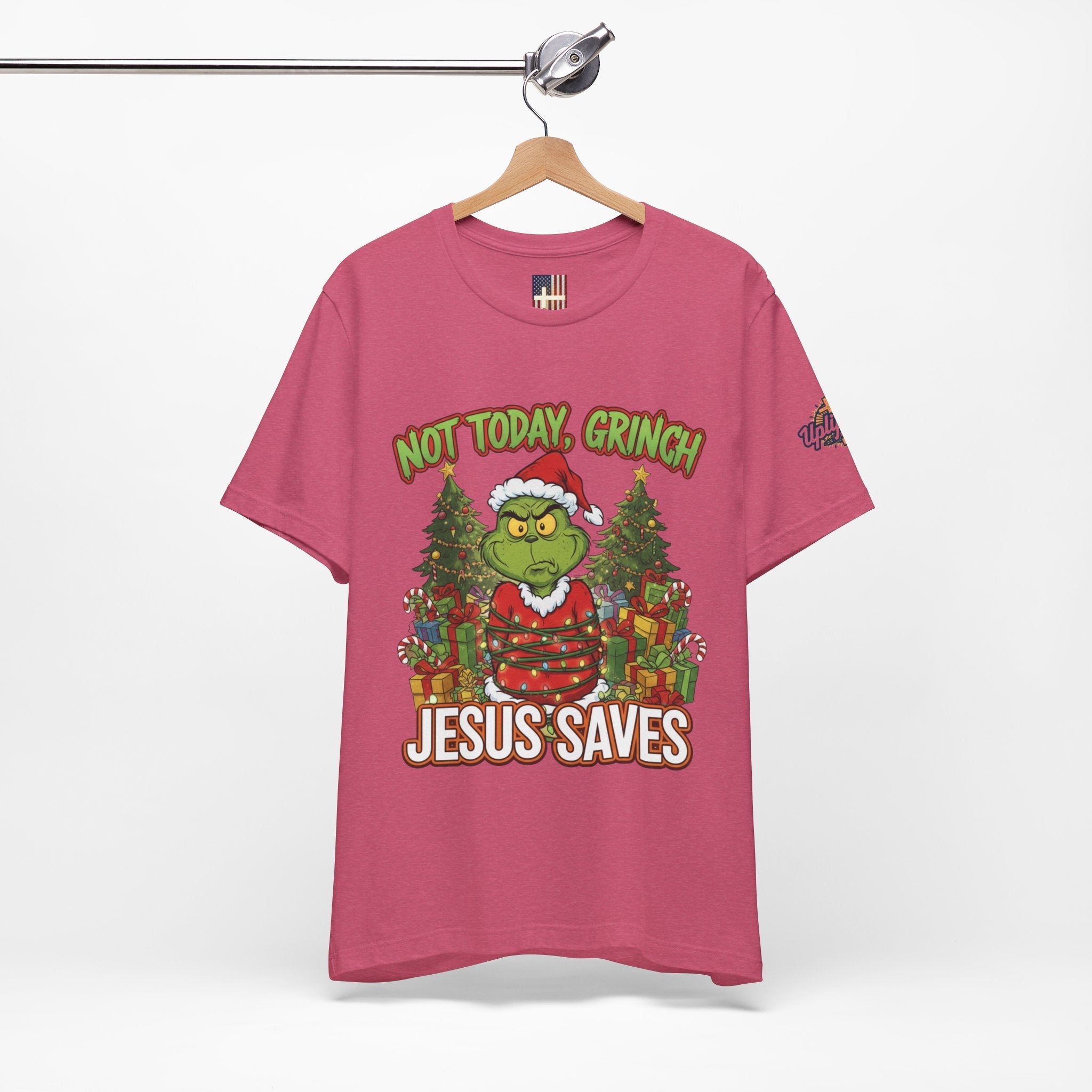 🎄 Not Today, Grinch – Jesus Saves | Funny Christian Christmas T-Shirt | Sulking Grinch & Glowing Cross | Bold Neon Faith Tee by Uplifted Gear Printify