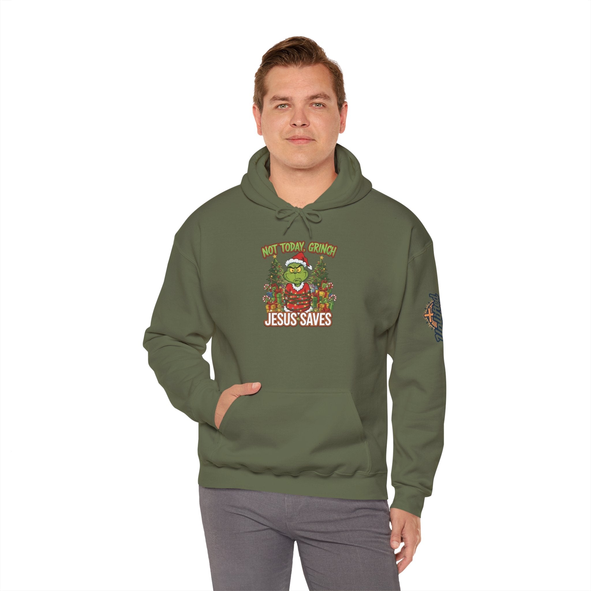 🎄 Not Today, Grinch – Jesus Saves | Funny Christian Christmas Hoodie | Sulking Grinch & Glowing Cross | Bold Neon Faith Tee by Uplifted Gear Printify